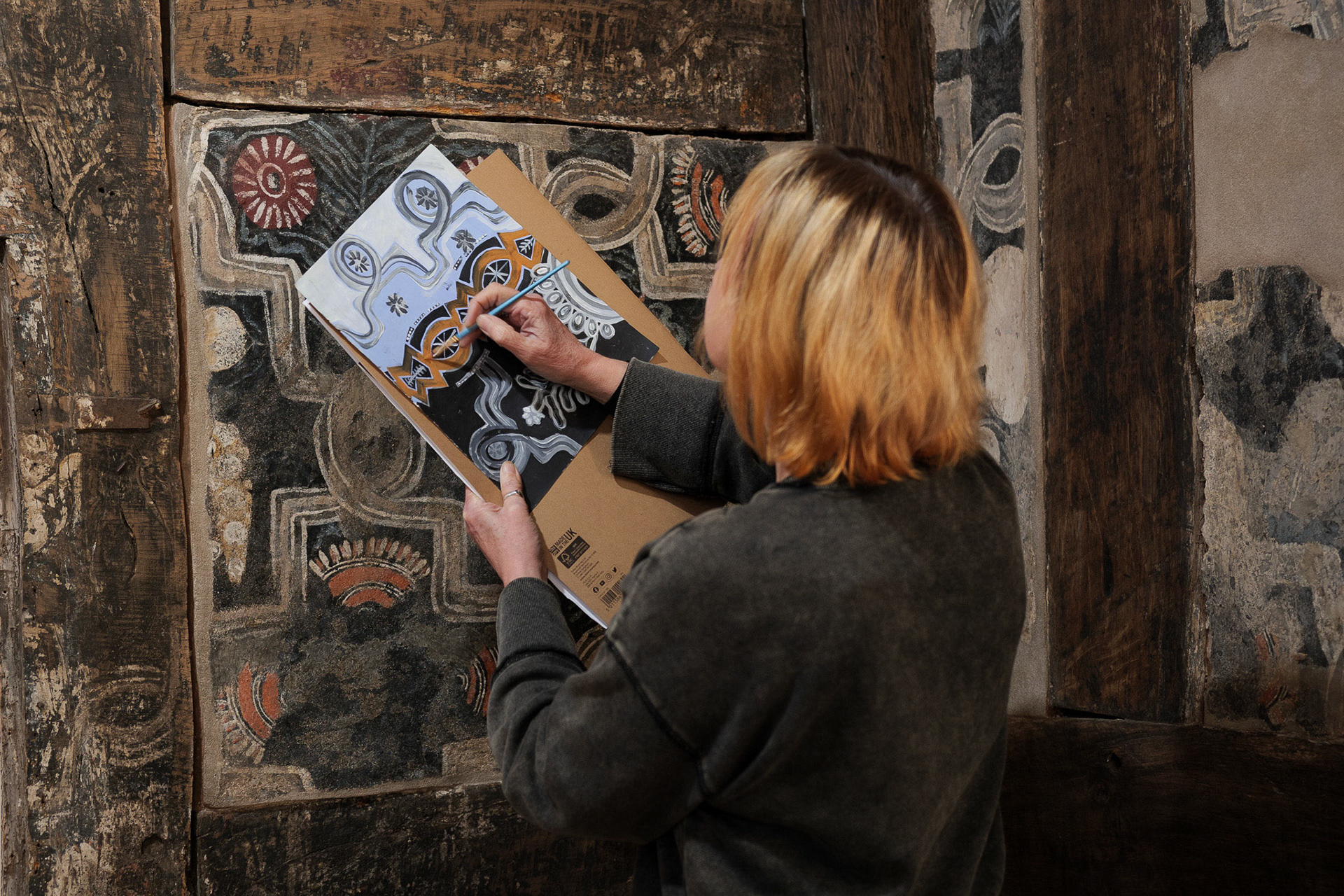 Artist in Residence Jeanette McCulloch at the 16th Century Painted Room in Ledbury.