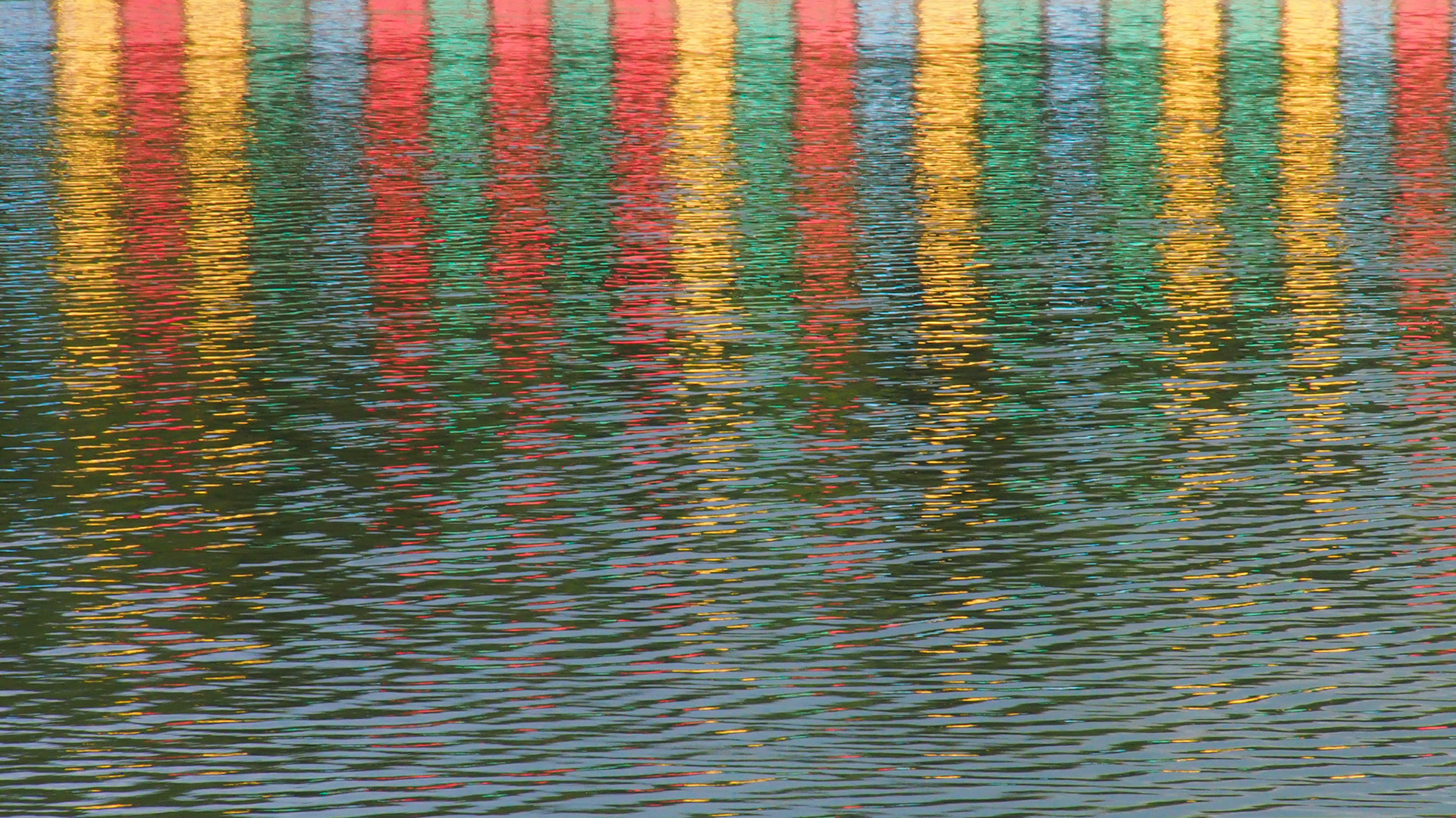 Beach hut reflections, North Wales