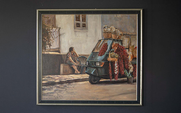 Painting with an Italian woman selling her merch in a piaggo ape 