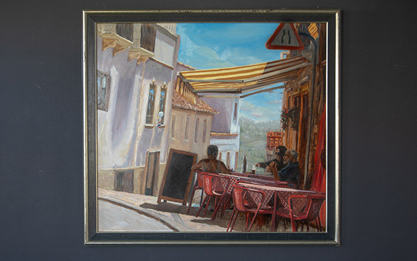 Painting of tourists on a Portugese terrace