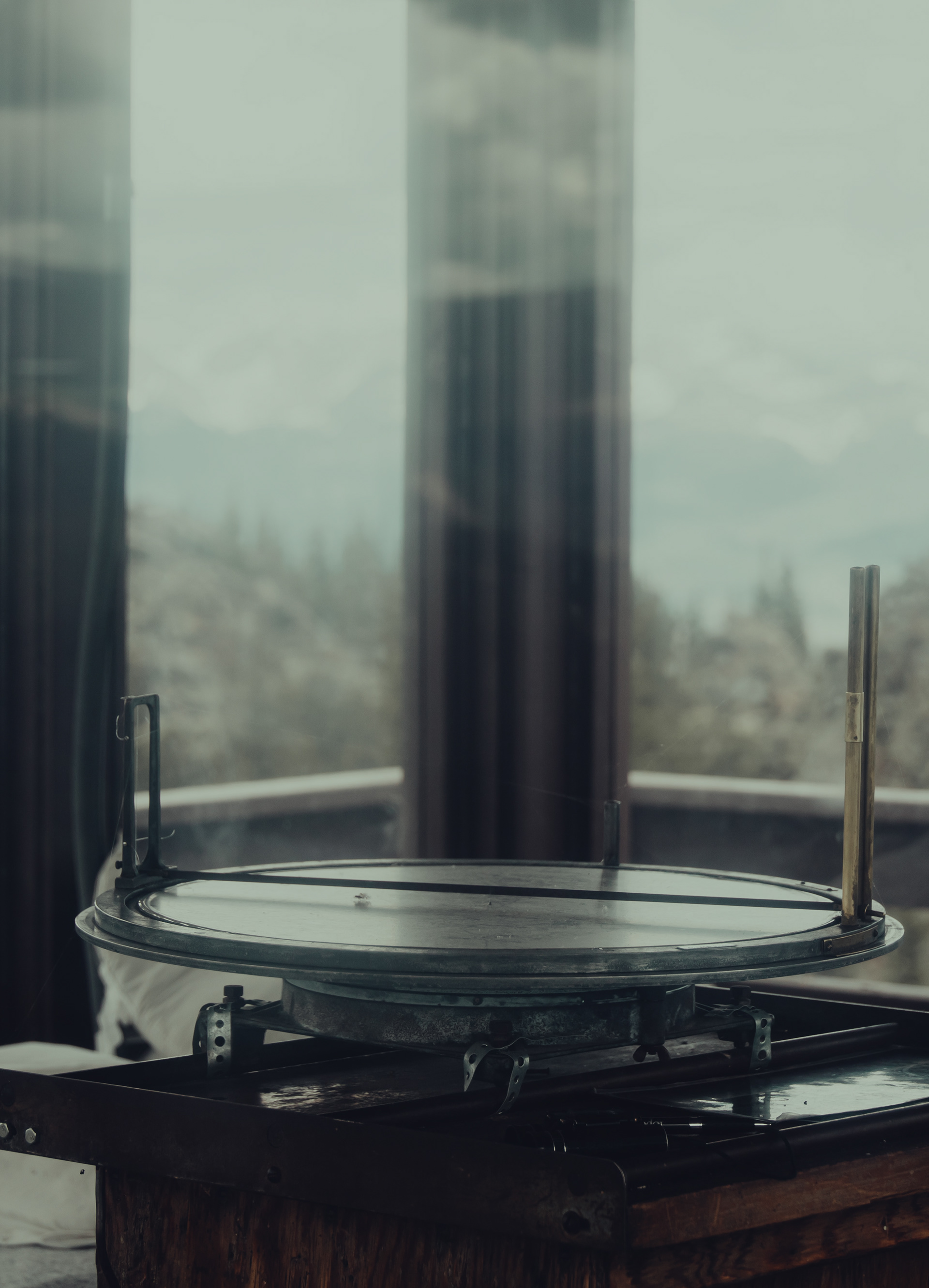 A fire finder would've been used by the lookout to pinpoint the general direction and distance of a fire