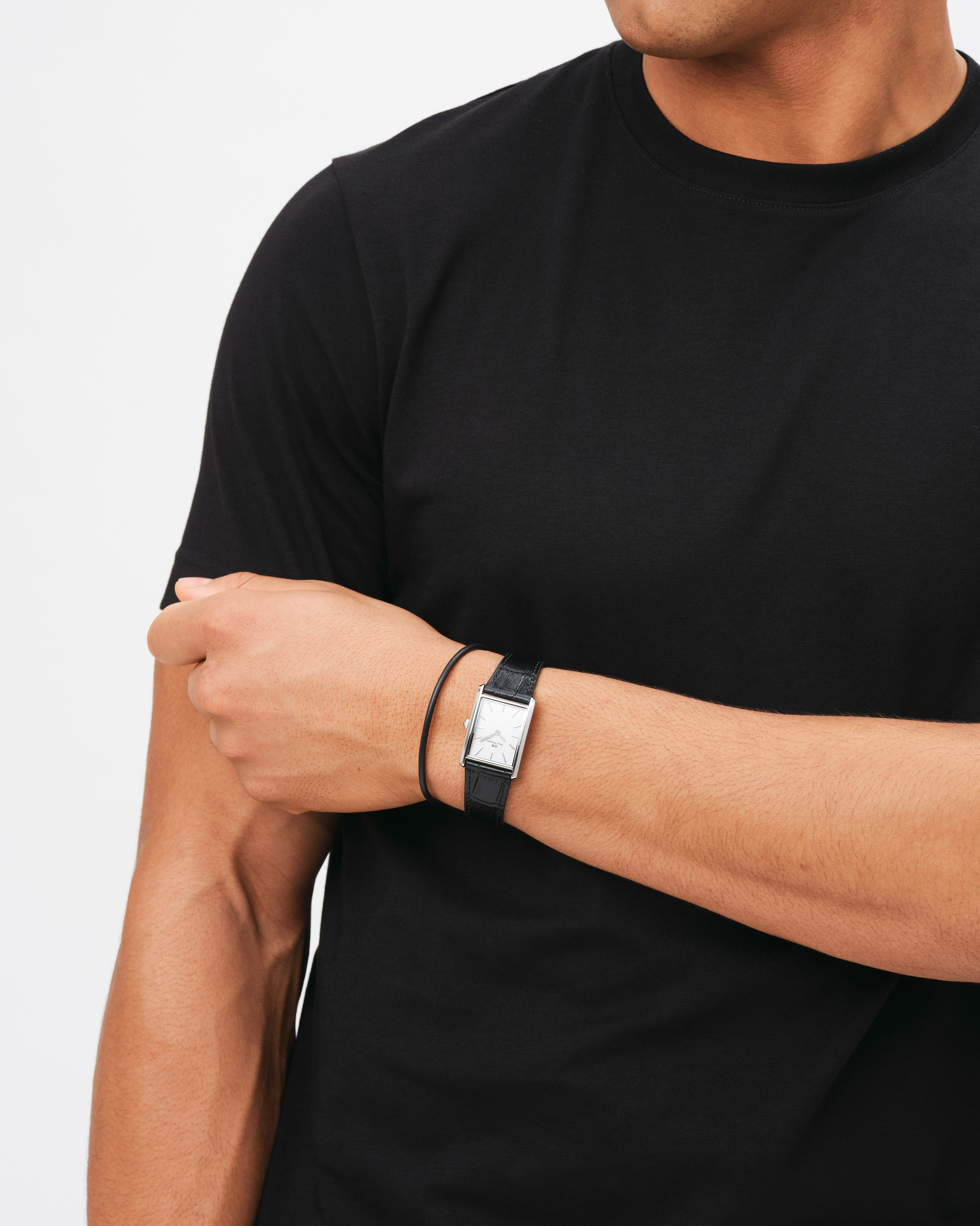 Modellbilder för klockmärket Daniel Wellington. Bilderna är fotade i en studio med fokus på klockorna