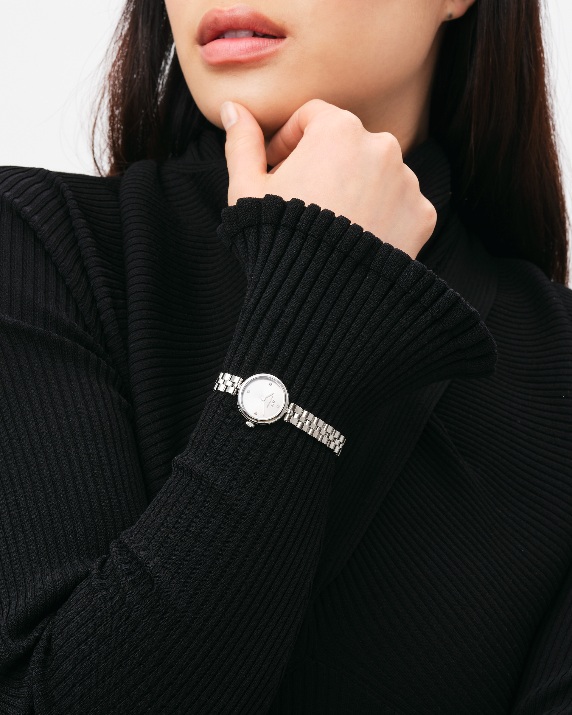 Modellbilder för klockmärket Daniel Wellington. Bilderna är fotade i en studio med fokus på klockorna