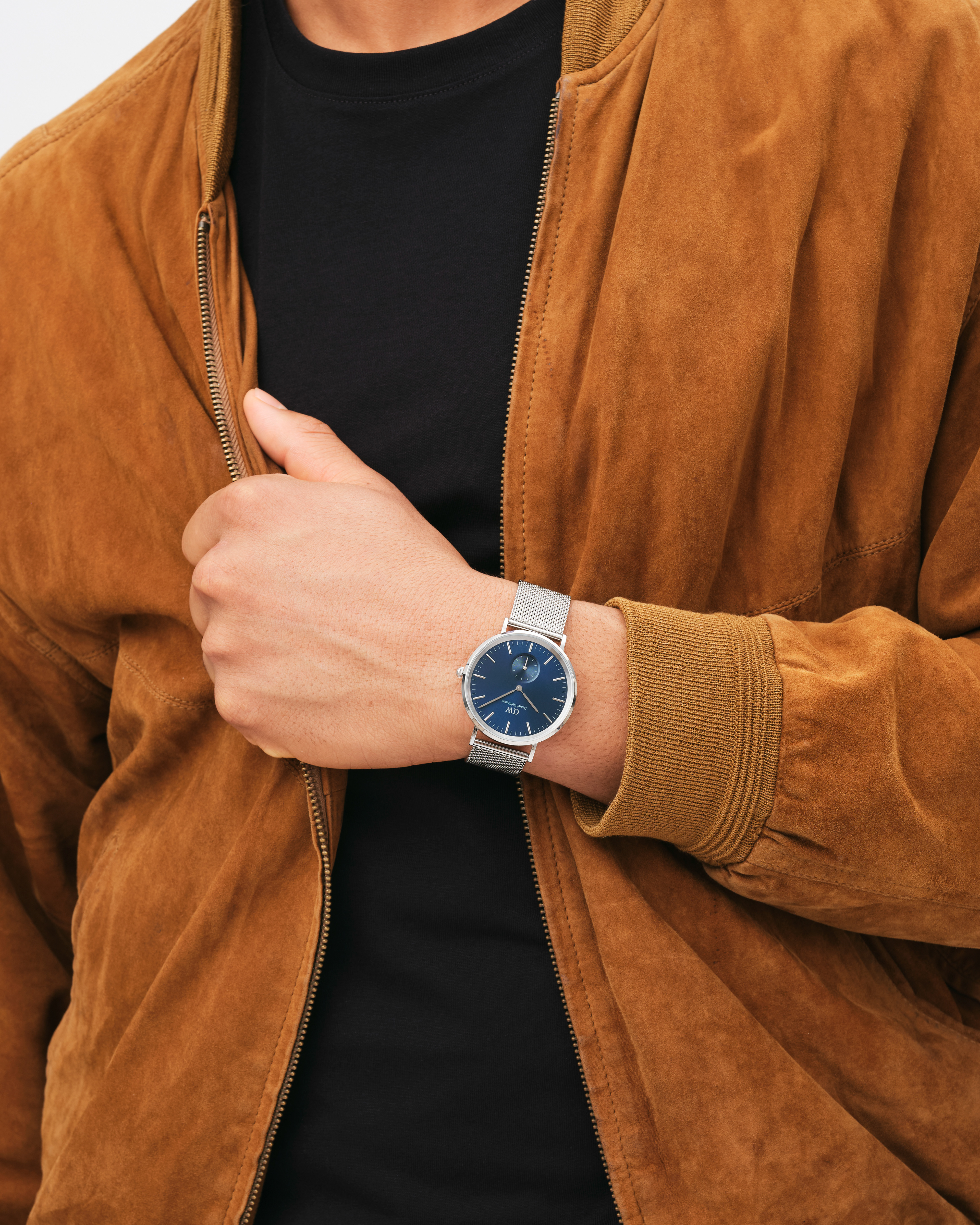 Modellbilder för klockmärket Daniel Wellington. Bilderna är fotade i en studio med fokus på klockorna