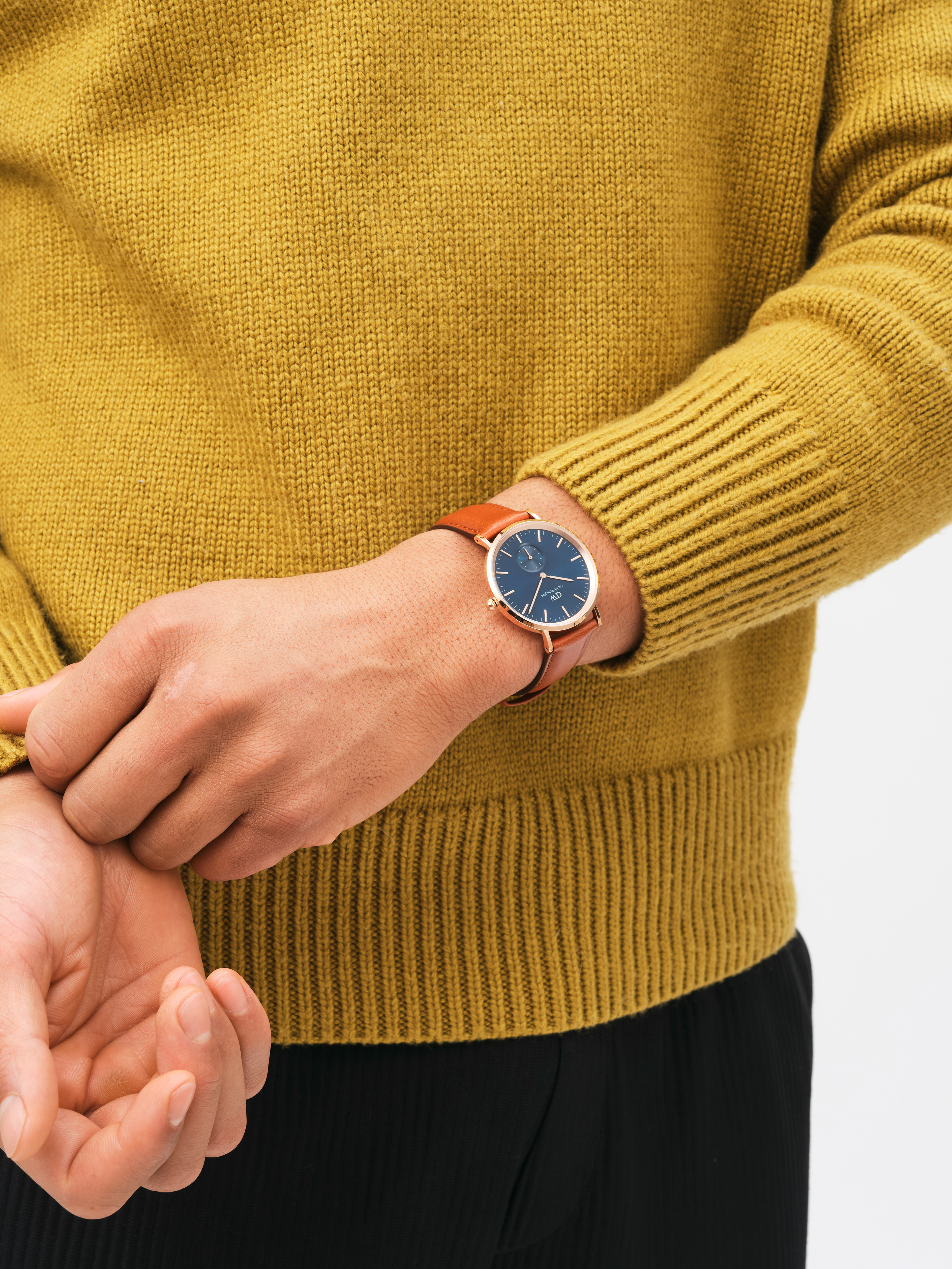 Modellbilder för klockmärket Daniel Wellington. Bilderna är fotade i en studio med fokus på klockorna