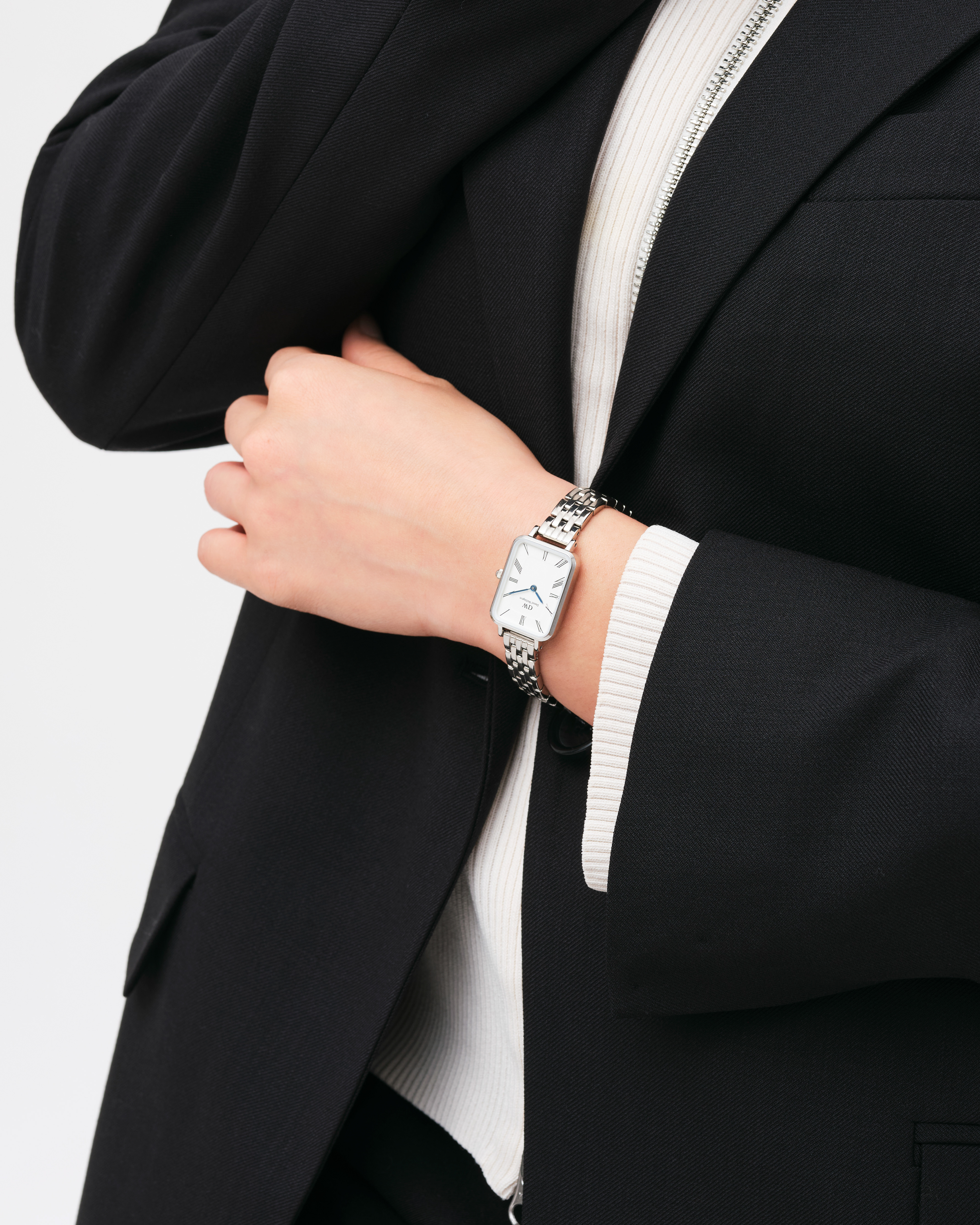 Modellbilder för klockmärket Daniel Wellington. Bilderna är fotade i en studio med fokus på klockorna