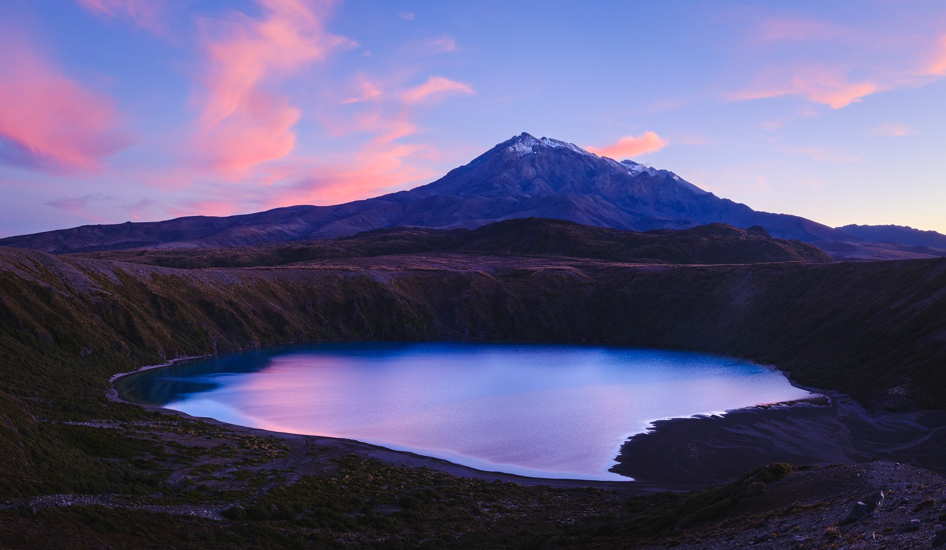Mount Ruapehu rises above Lower Tama Lake in  Tongariro National Park, North Island, New Zealand