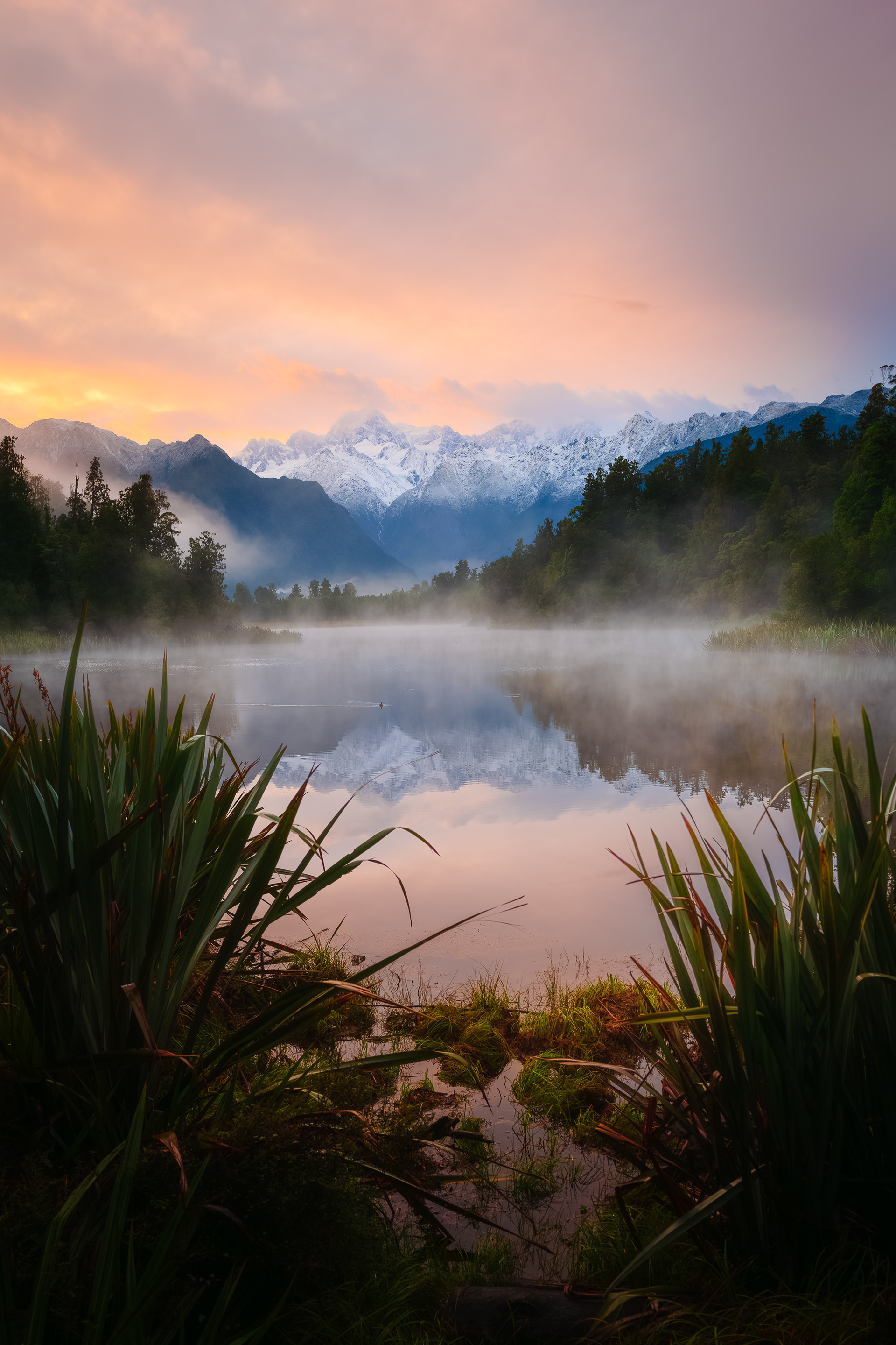 Mount Cook rises behind Lake Matheson