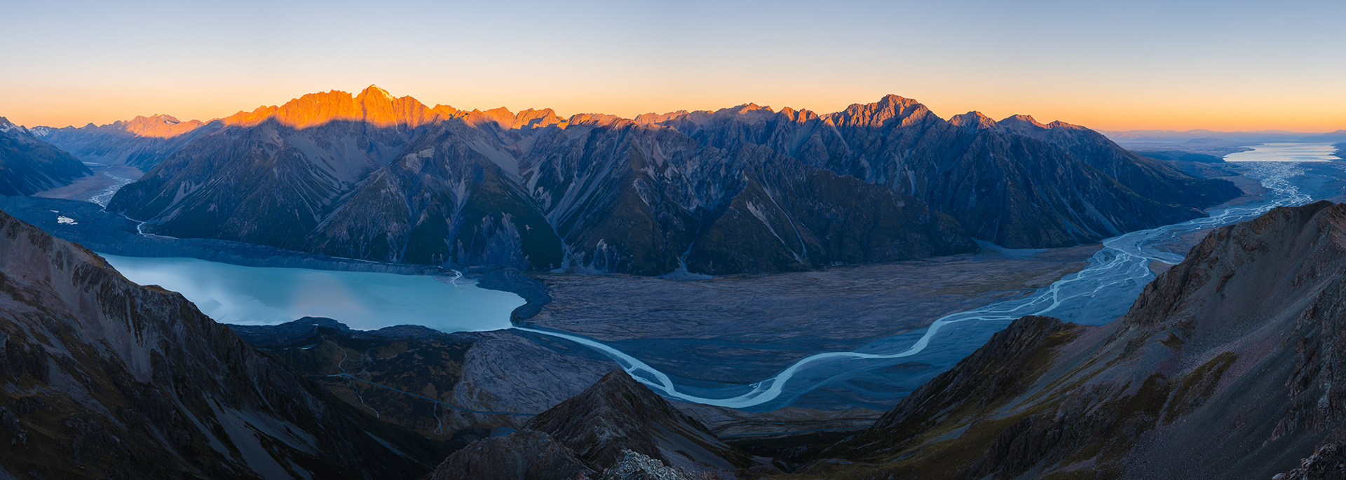 Panorama of Tasman Lake and River from Mount Wakefield in Aoraki Mount Cook National Park New Zealand