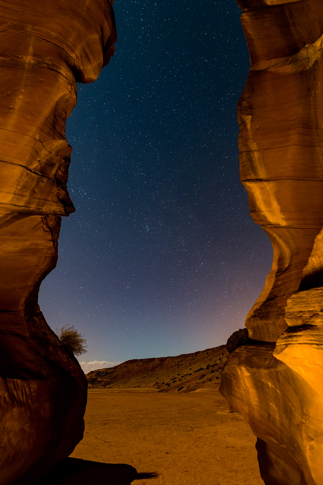 Standing just inside the upper #antelopecanyon the #stars are visible even with the light painting inside the canyon.  This looks like walking through an #entrance into another world.  I'm always astounded by how different the world can be with #astrophotography and #longexposure. #Nikon #D850 13s f/3.2 ISO 1600 24mm #sigma