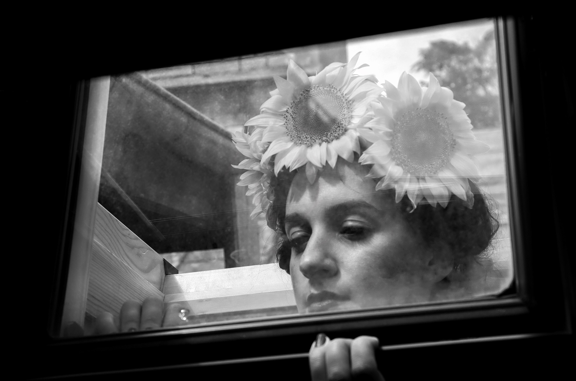 portrait reflected in window inspired by Frida Kahlo