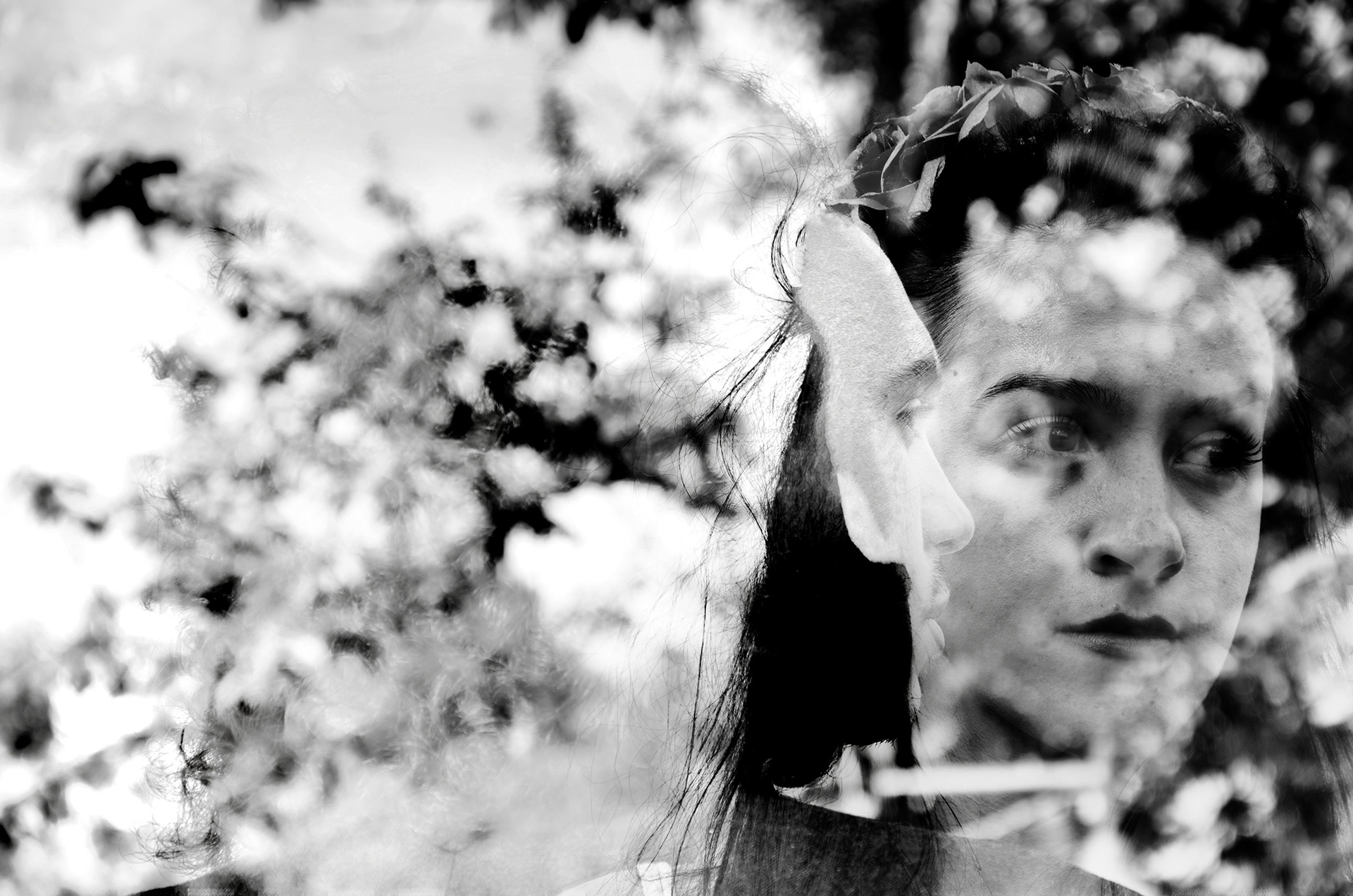 double exposure portrait with flowers inspired by Frida Kahlo symbolism