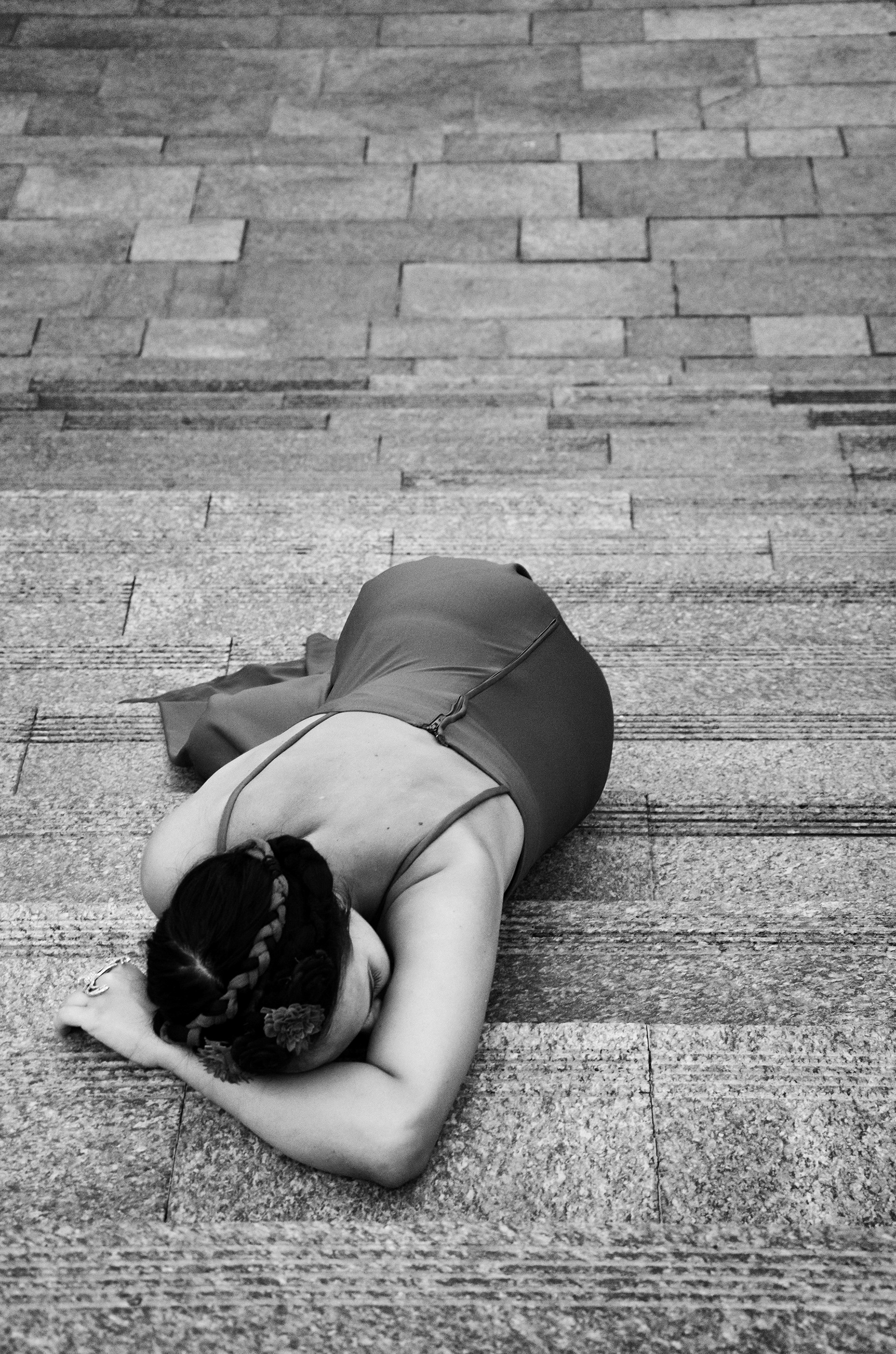 resting figure on stone surface inspired by Frida Kahlo