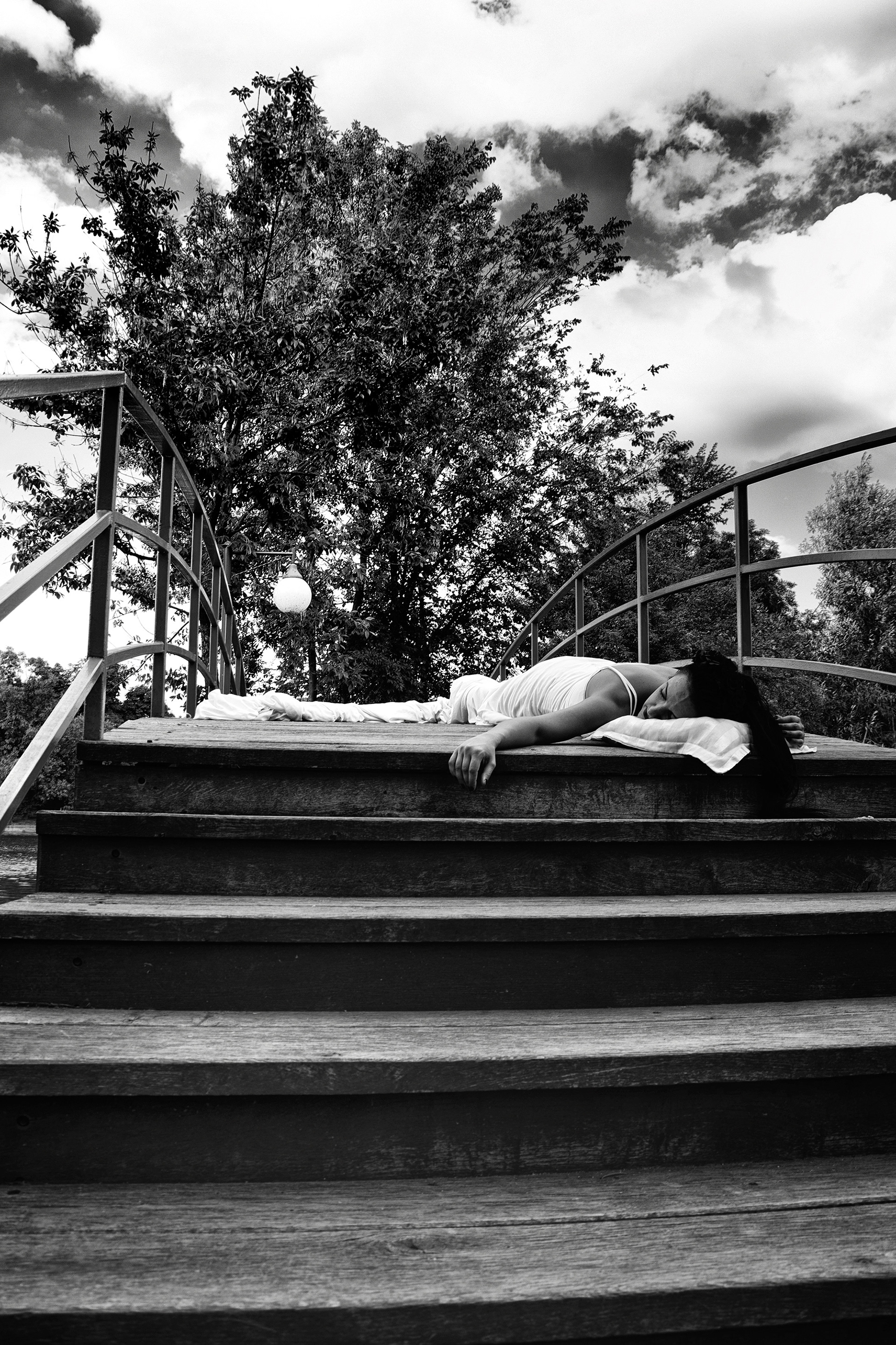 figure resting on stairs inspired by Frida Kahlo compositions