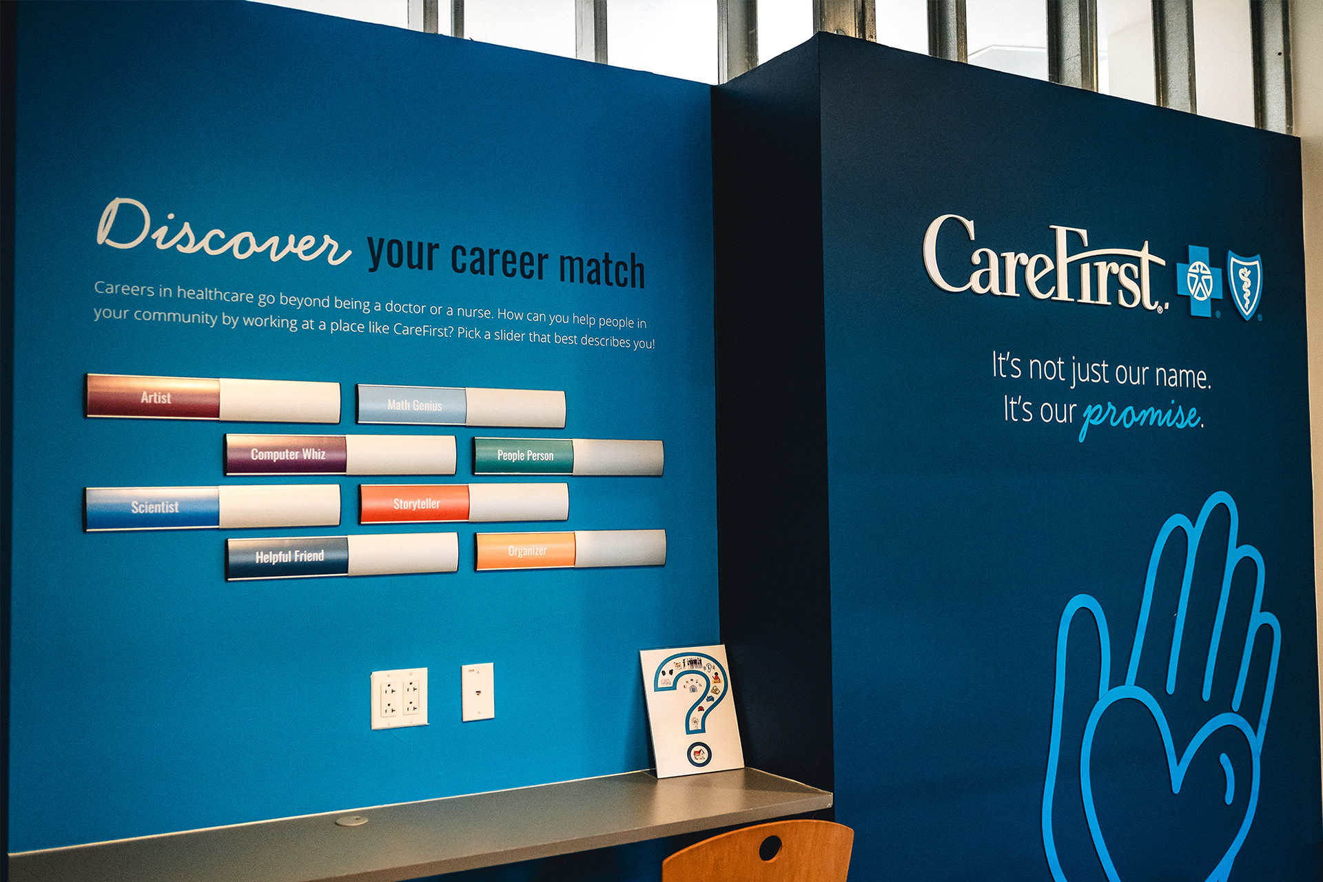 Interactive sliders reveal career descriptions (ex. Artist > Graphic Designer: Use images and design to tell stories and help people understand information.)