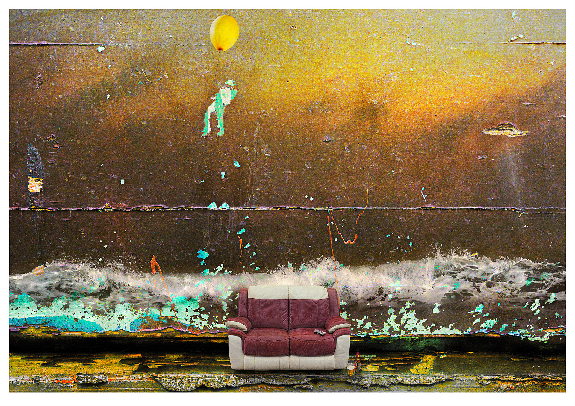 ESCAPE 'Sitting between two chairs' is a poor choice as rising sea levels threaten coastal communities, ecosystems, and infrastructure worldwide due to melting ice and warming oceans. A surreal image depicting a man escaping by floating up and away from a large wave about to break over his sofa, he is transported aloft by a yellow balloon. The base image including the man is a crumbling paint spattered cement rendered wall. On the sofa is a games controller and by the side a glass with a bottle of beer. To the right a flying saucer is suggested by way of a distressed hole in the cement. The narrative is about oblivion to global warming.