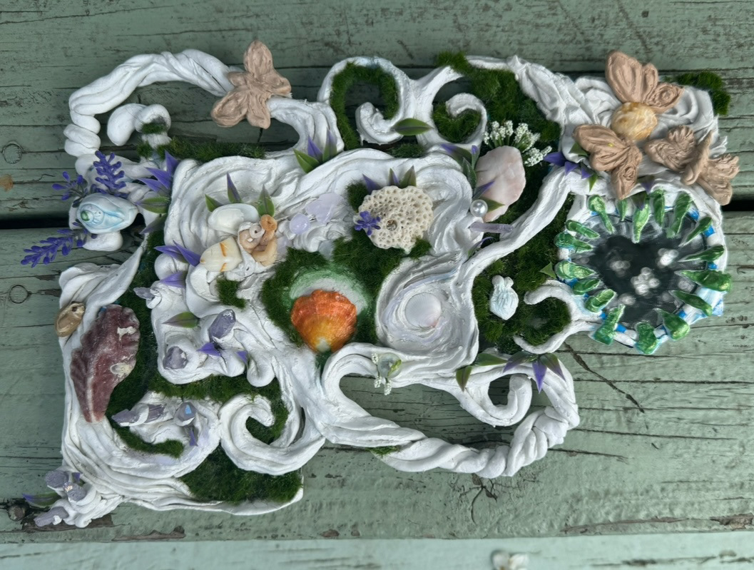 Experimental mixed media piece - air dry clay, sea shells, nail polish, fake moss, mirror, popsicle sticks, polymer clay, hot glue, photo frame,  wood samples, fake crystals, fake lavender, earrings