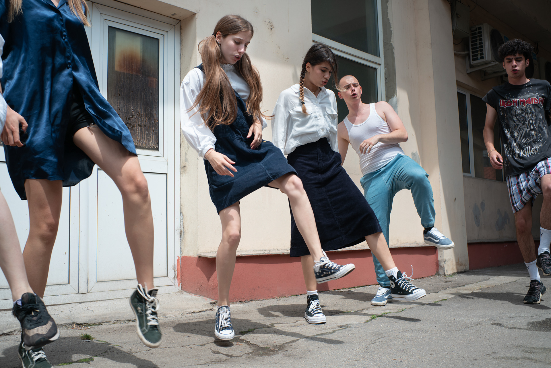 Members of the Brainstorming Bucharest theatre group warming up before a performance. Bucharest, May 2021.