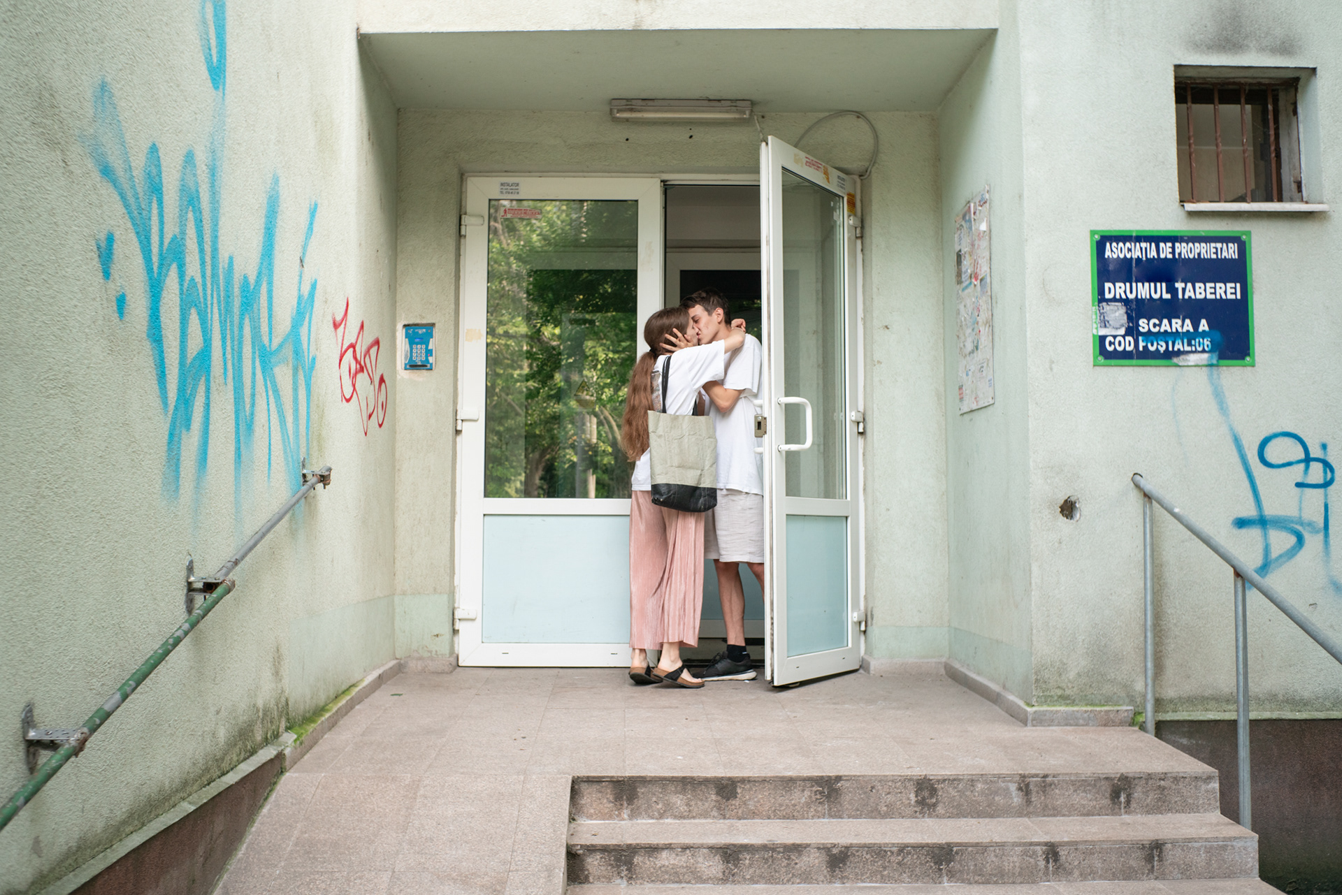 Diana and Dani (her boyfriend) in front of Diana’s apartment building. Bucharest, June 2021.