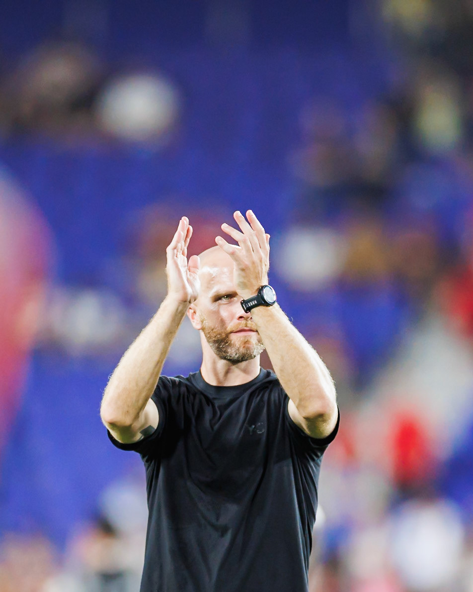 Michael Bradley acknowledges supporters after the final whistle.
