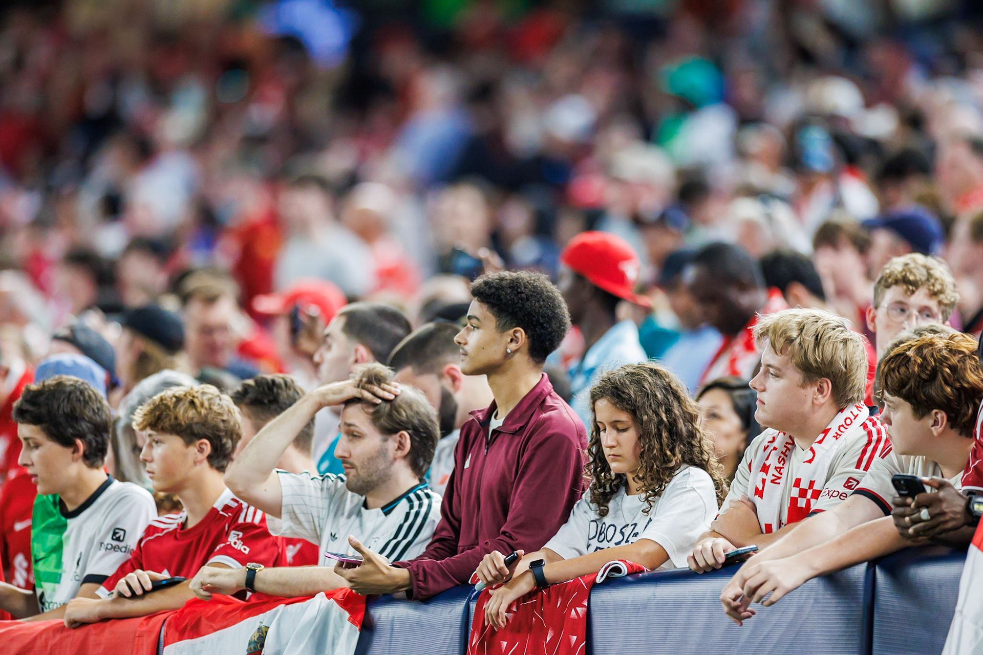 Supporters watch Liverpool FC vs Wrexham AFC in New York City.