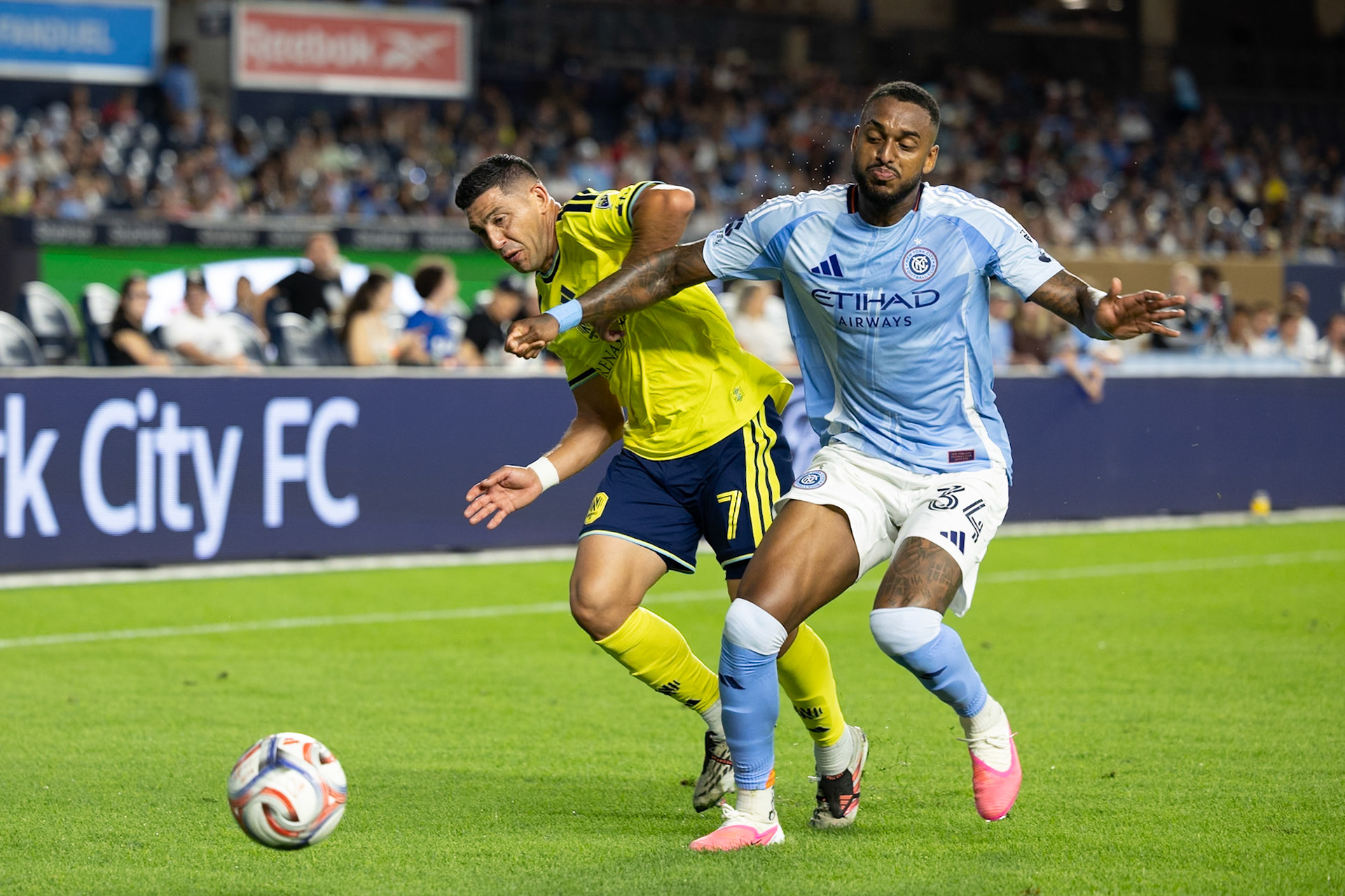 Raúl Gustavo (34) of New York City FC battles for possession against Nashville SC.