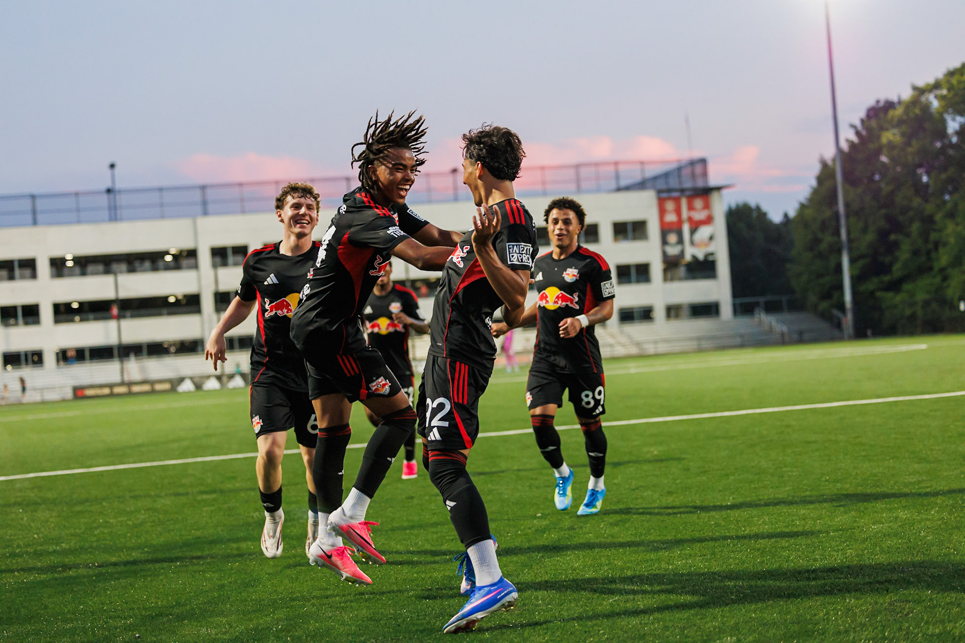 Teammates celebrate with Dennis Nelich.