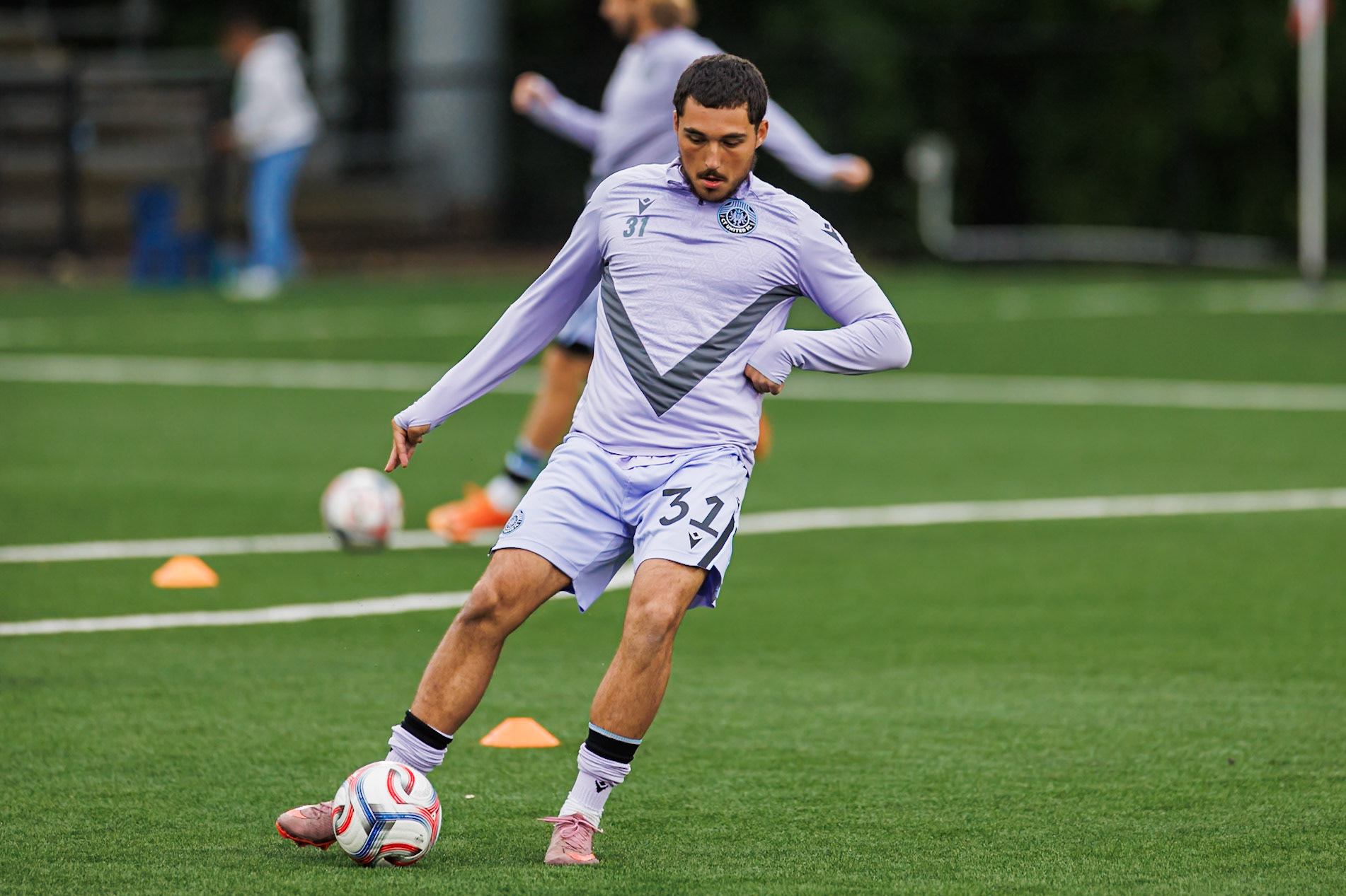 CT United FC player warm up before the match.