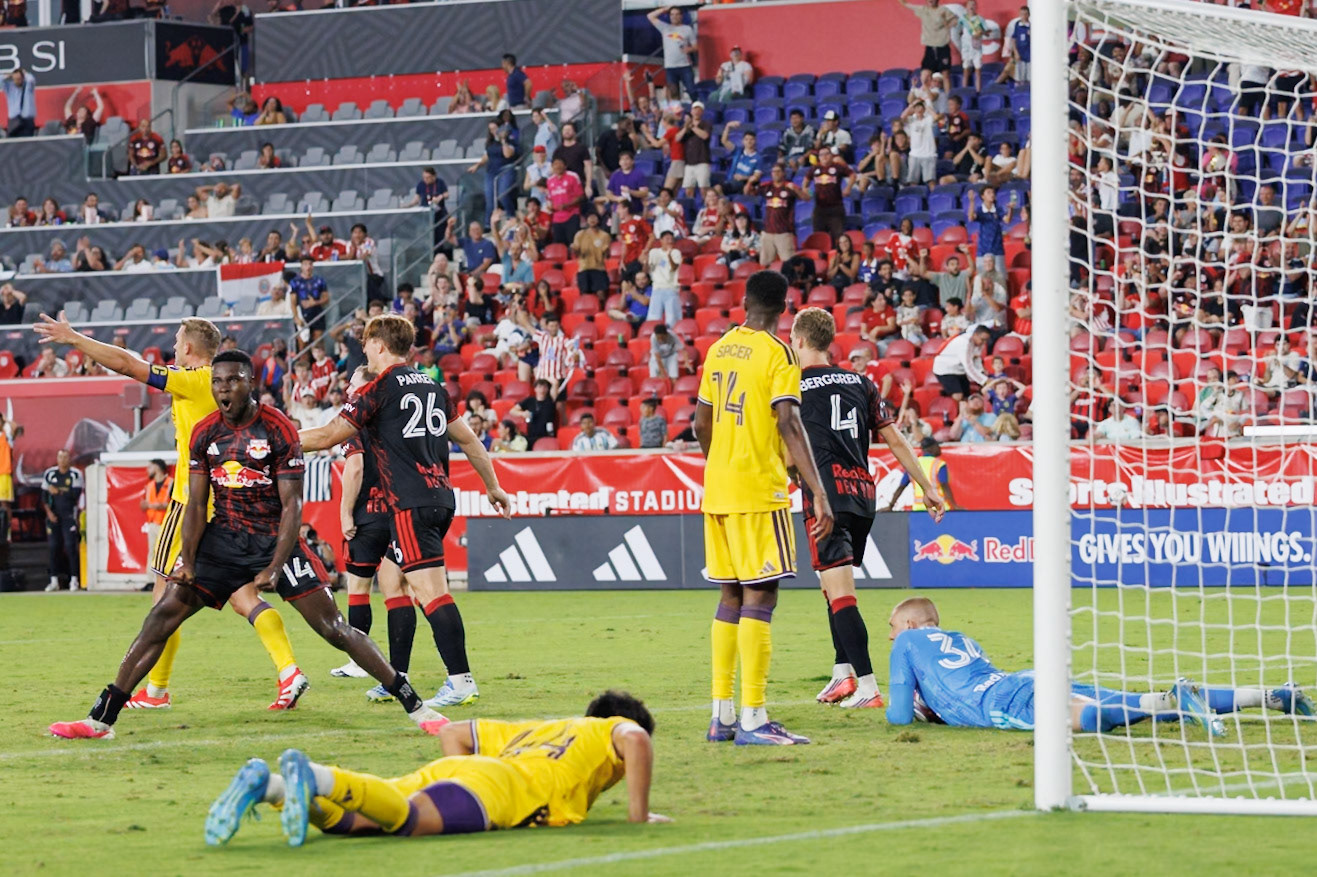 Julián Bazán celebrates after Ethan Horvath secures the ball.