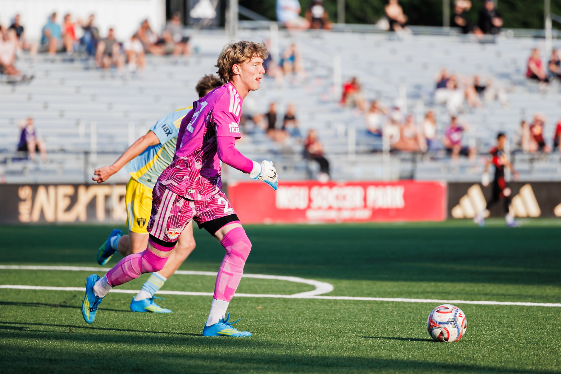 Aidan Stokes prepares to distribute the ball.