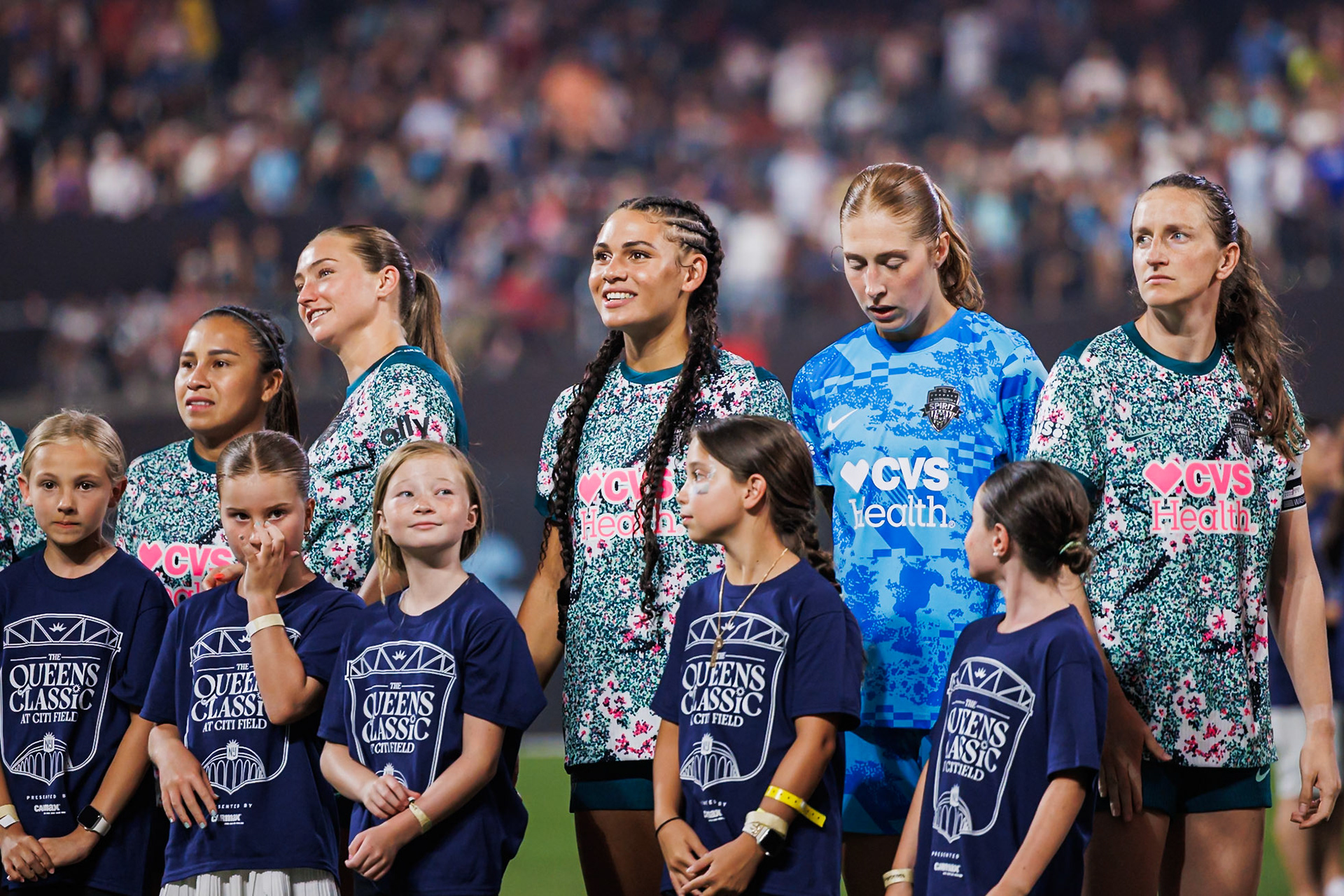 Washington Spirit players line up before the match.