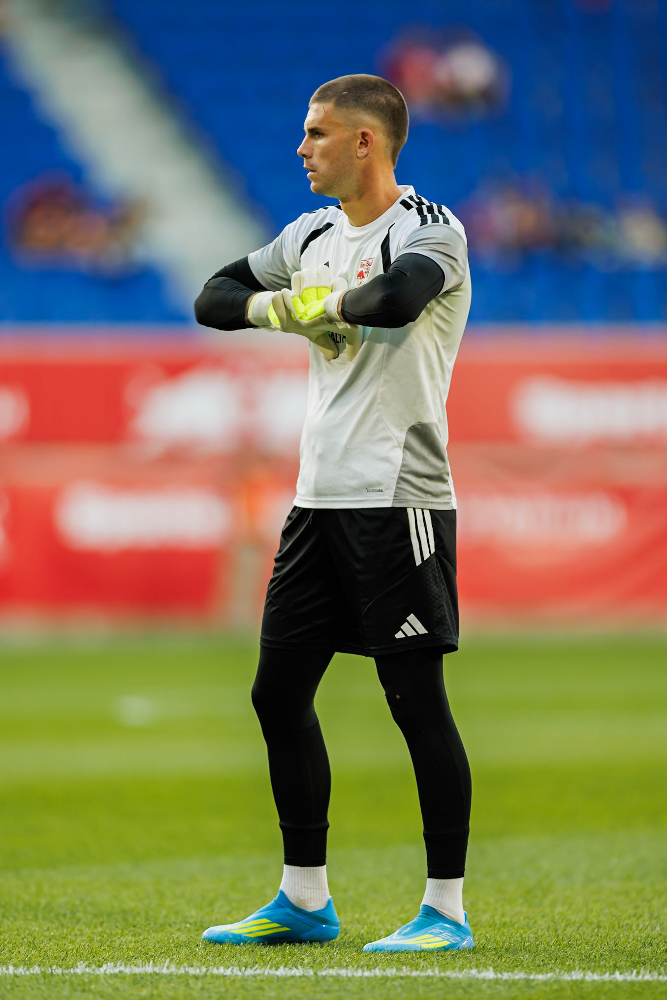 John McCarthy (#77) warms up before the match.