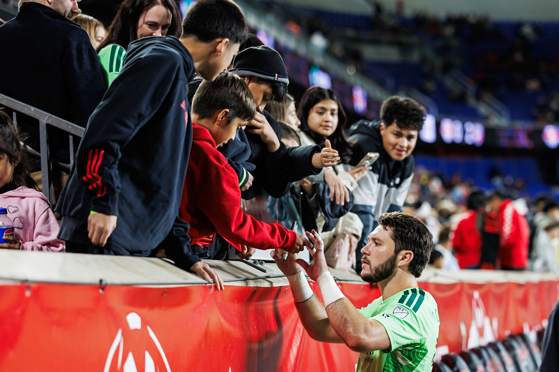 Players greet supporters after the final whistle.