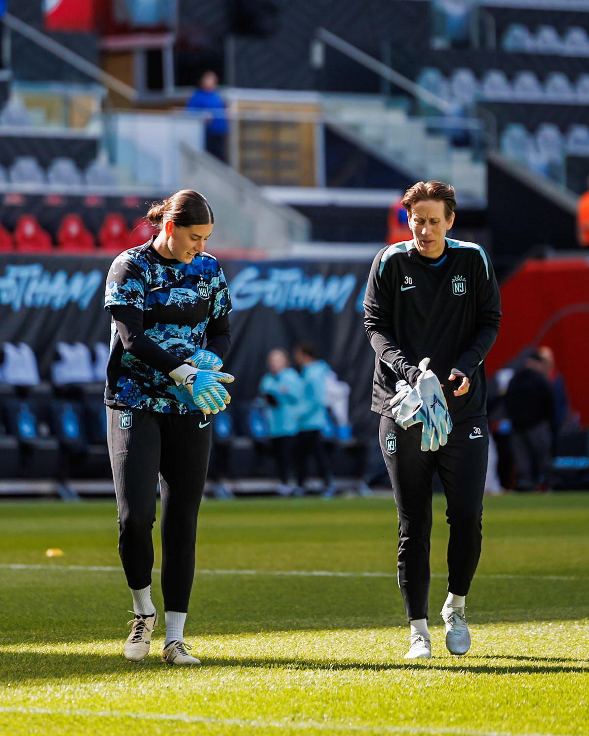 Shelby Hogan and Ann-Katrin Berger during Gotham FC warmups.