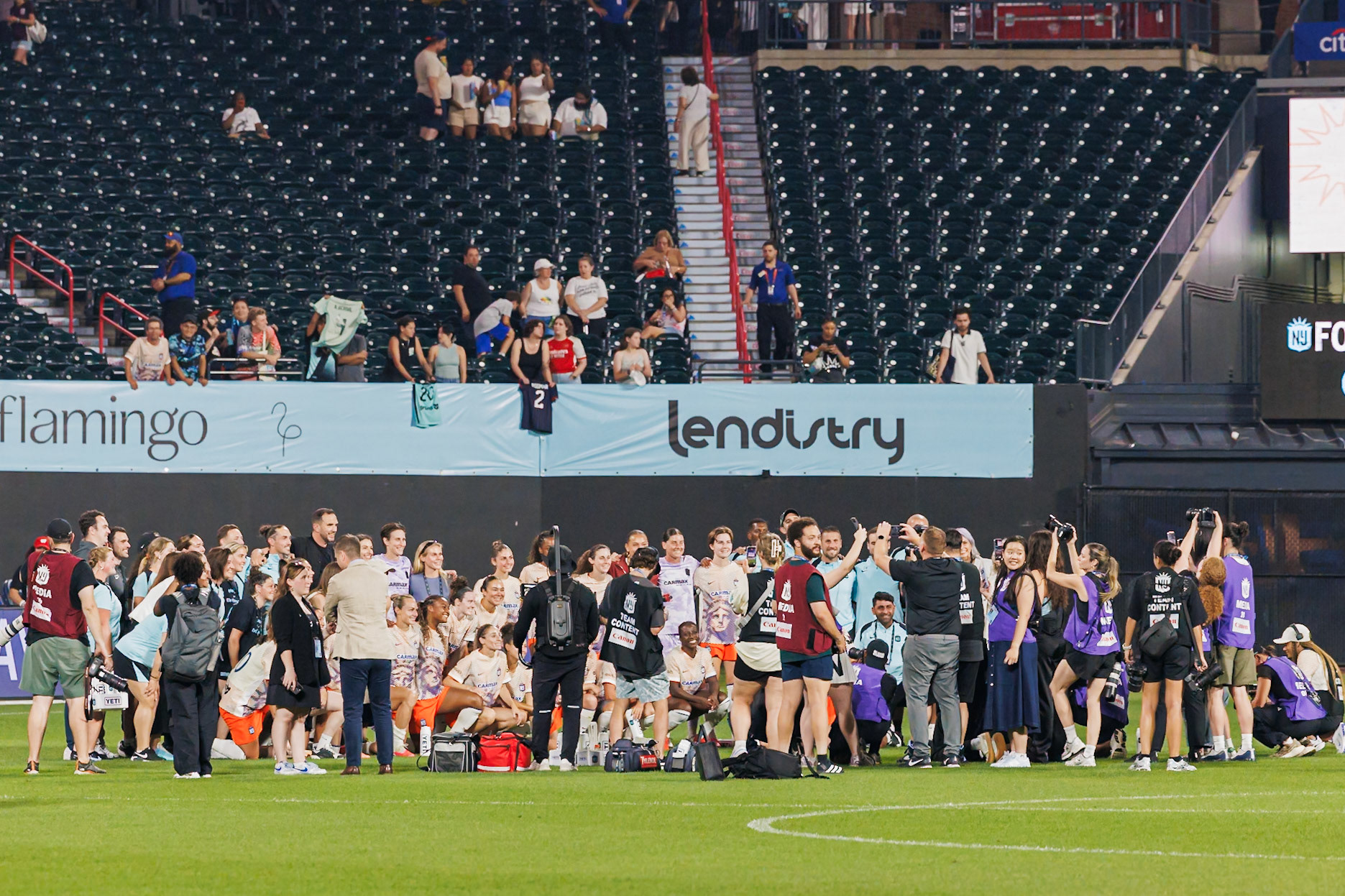 Gotham FC players gather after the final whistle.