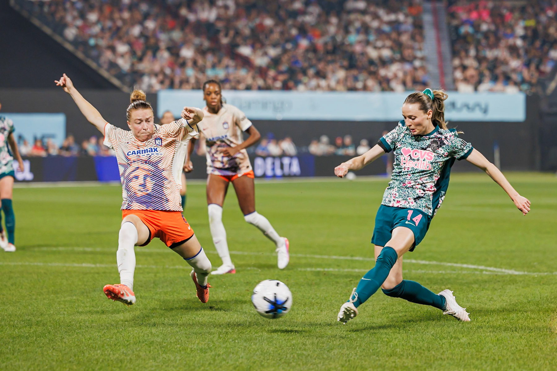 Emily Sonnett from Gotham FC defend inside the penalty area.