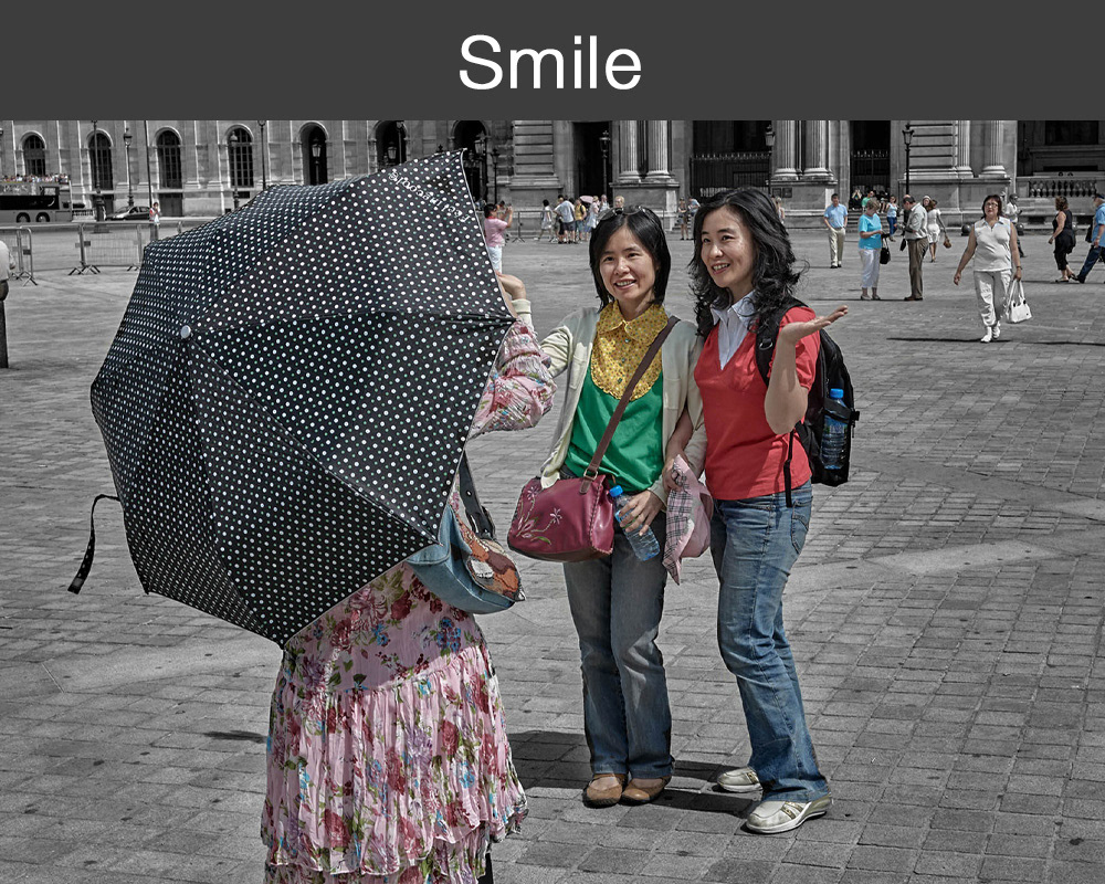 Smile - Happy smiling people having their photos taken photo wall art by professional photographer Paul E Williams.
