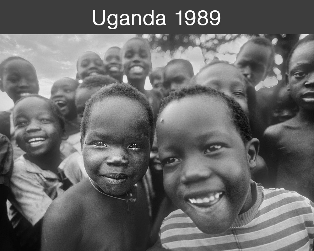 Uganda - Archive vintage photos of the Karamajong tribal people in their traditional villages and the people of West Nile Uganda. Reportage photo wall art by professional photographer Paul E Williams.