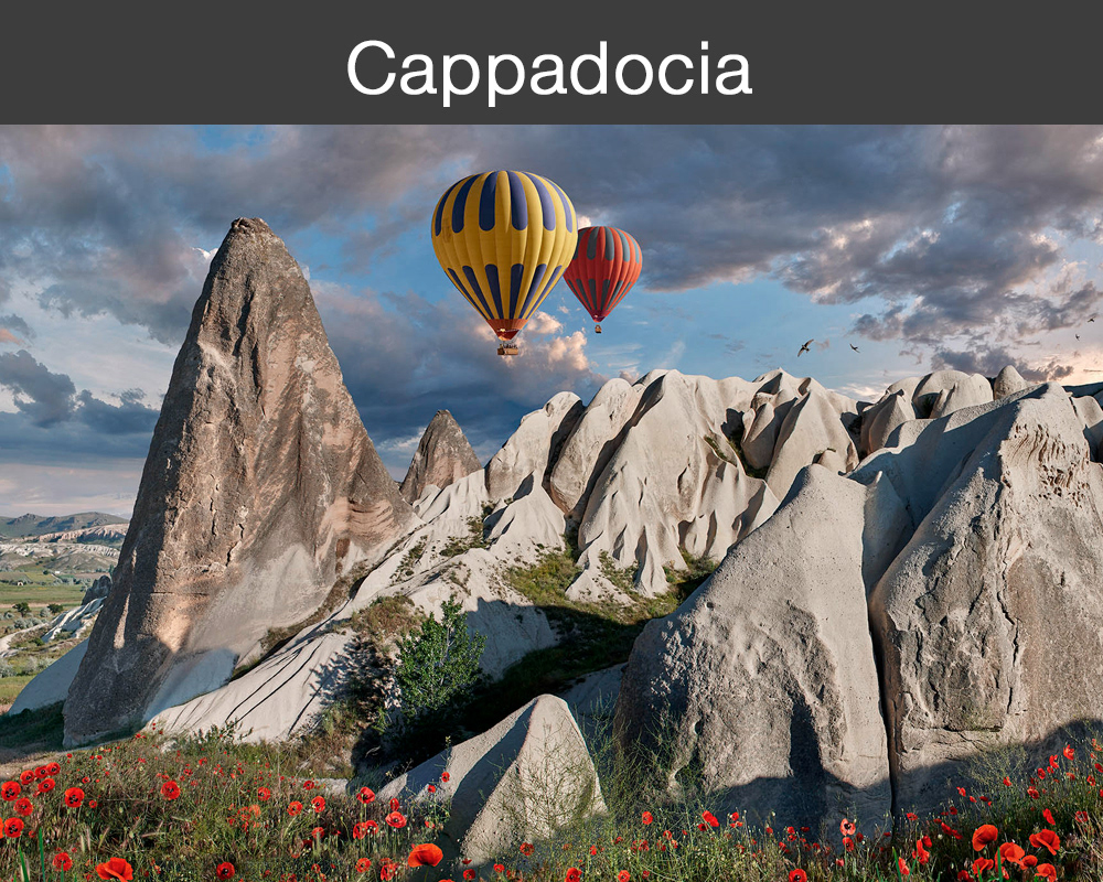 Photos of the rock formation fairy chimney hoodoos of cappadocia turkey with Hot air balloons wall art photos by photographer Paul E Williams