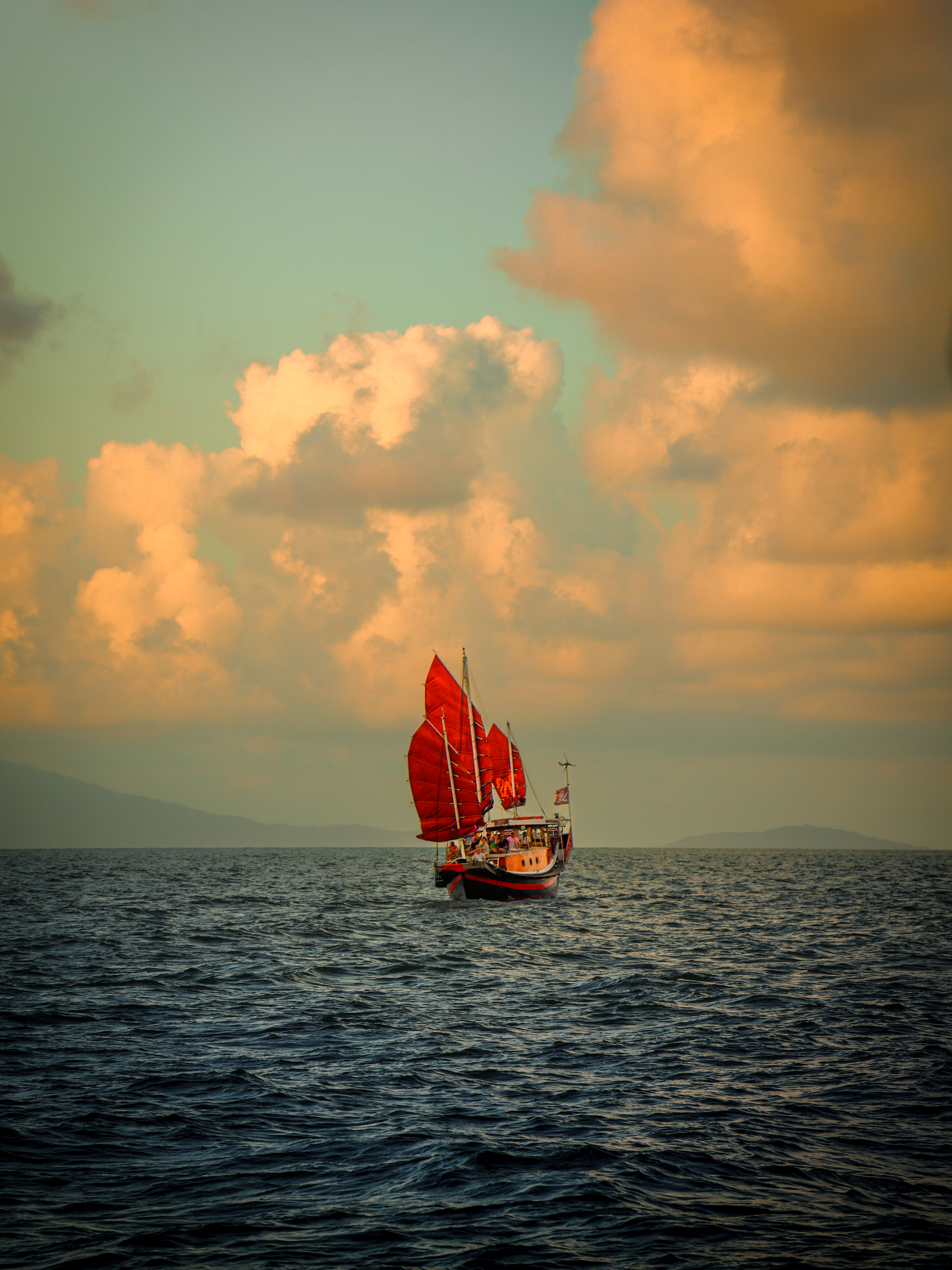 A Red Sail in a Painted Sky - Port Douglas 2024