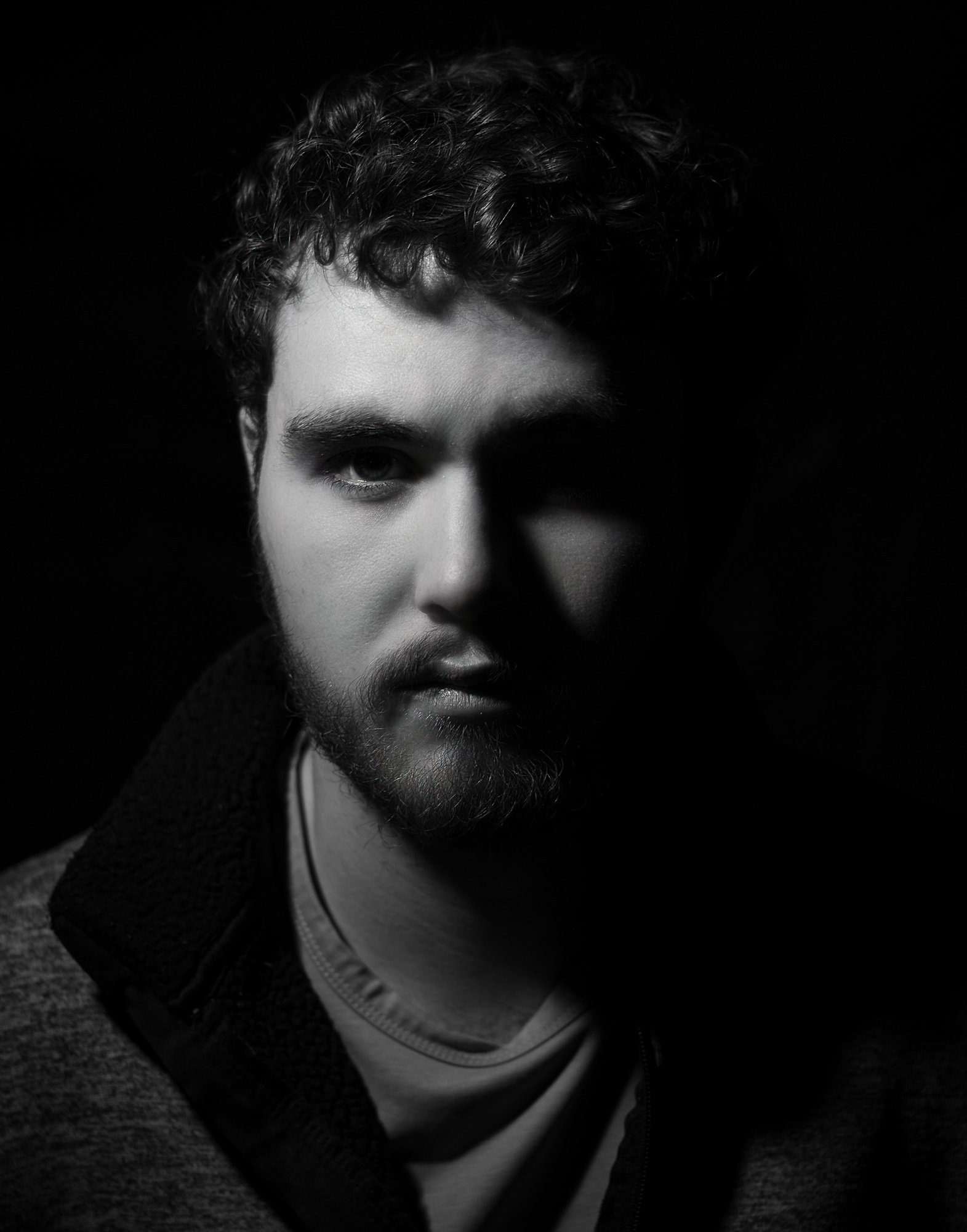 Black and white rembrandt portrait of a man