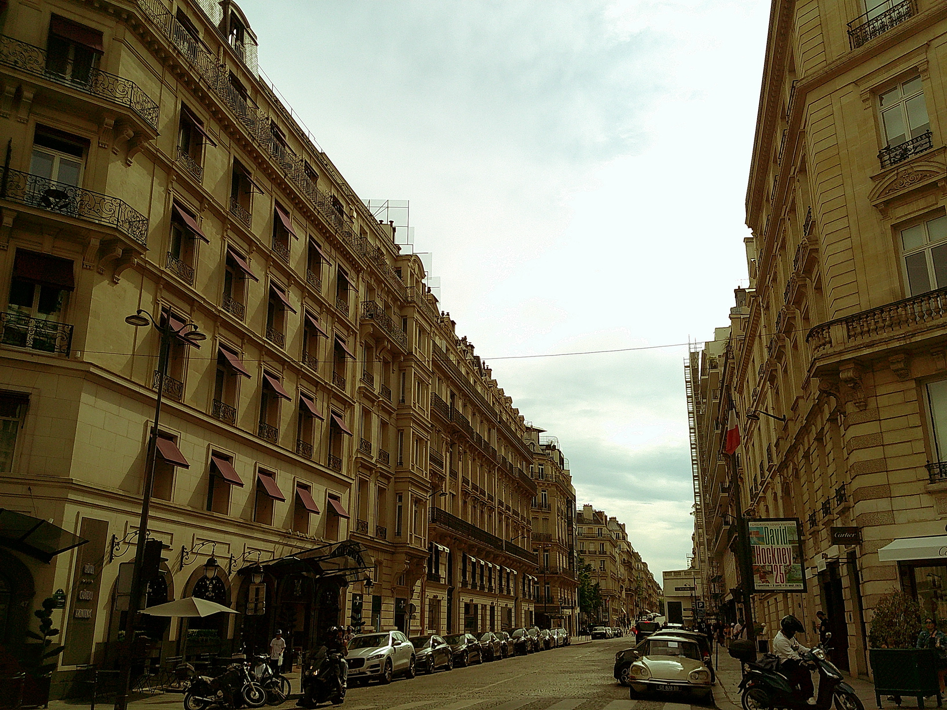 While vacationing in Paris, this photo was taken as Alexandra and her family walked the streets to go out for lunch. 