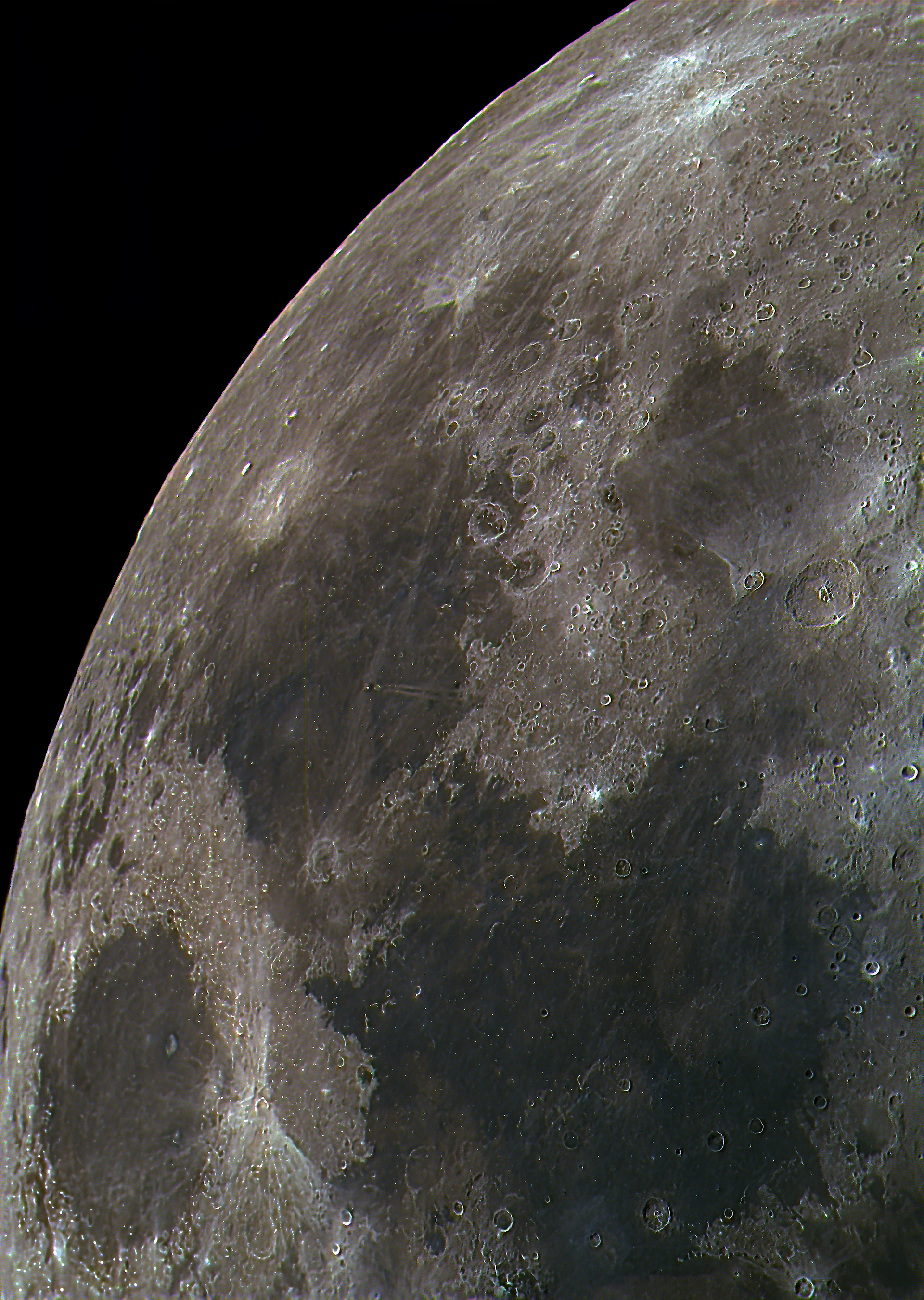 This image unveils the Moon’s rugged surface, where ancient craters and shadowed ridges paint a timeless story of cosmic impacts. The dark lunar maria, like frozen seas, contrast against the bright crater rays that splash across the surface. It’s a scene of celestial artistry, where volcanic plains and meteorite scars blend to create the mysterious face of our eternal night companion.