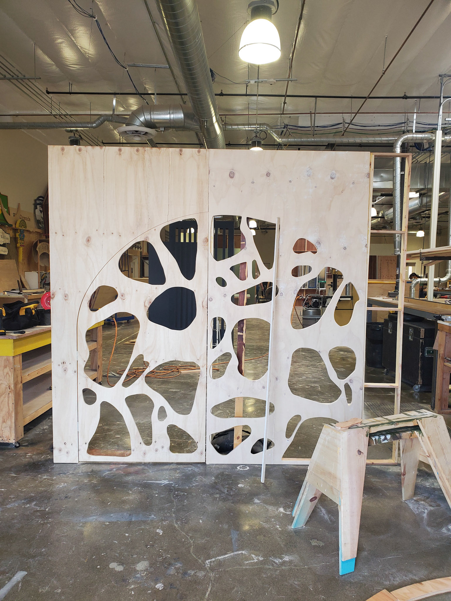 Attaching the door (left panel) to the wall and doorframe structure..