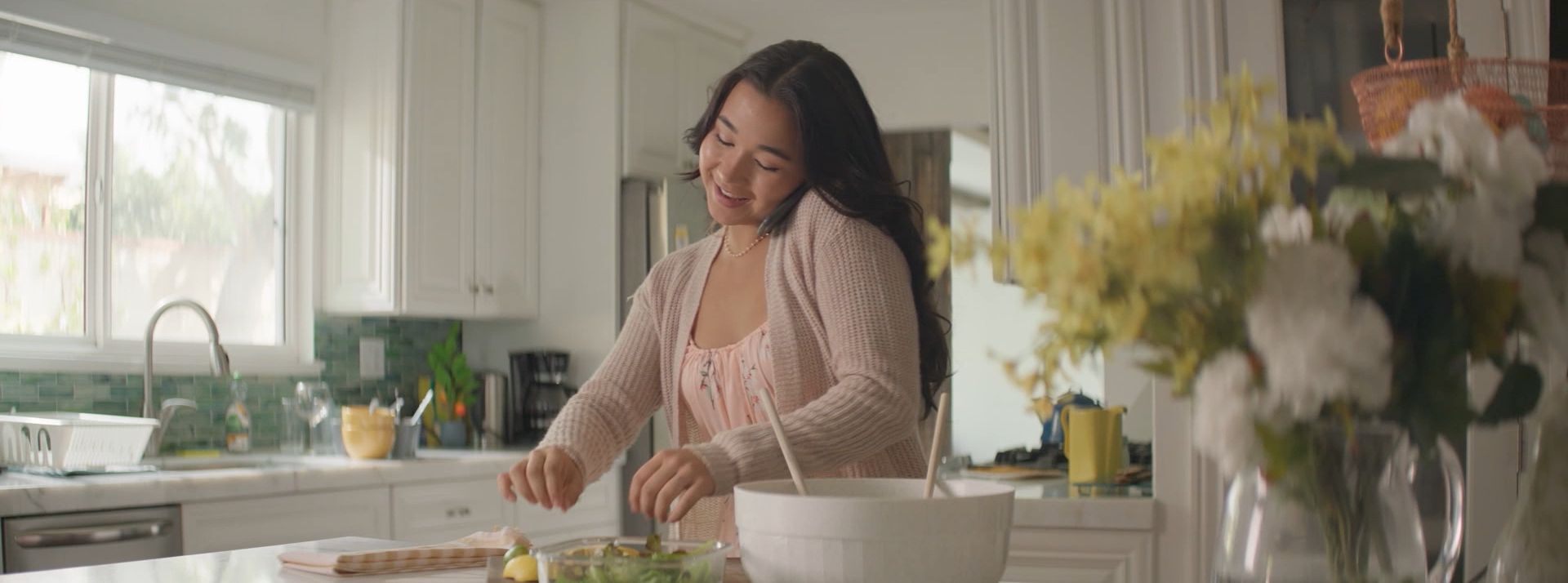 The Slaters' kitchen is bright and airy with pops of yellow.