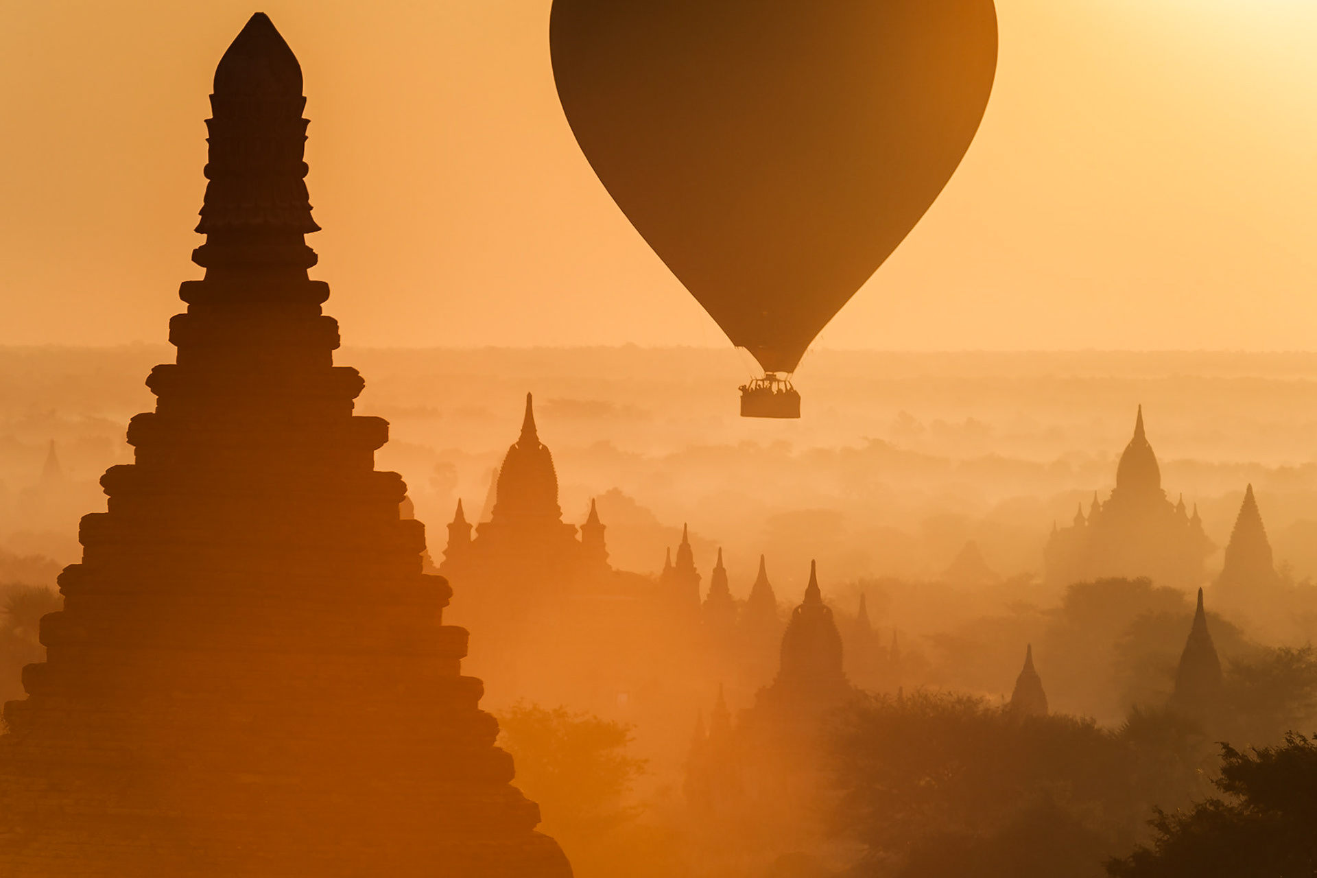 There is nothing more awe inspiring as watching the sunrise and set from the top of one of the temples in the central plain in Bagan. Back in the day, the Kings of Bagan commissioned the construction of some 4000 Buddhist Temples, but only around half remain standing today… but what a sight they are. What's more is the balloons (from Bristol!) are now an accepted sight as they drift silently across the orange glows of dawn. Easily the most memorable experience in Asia to date. Stunning.