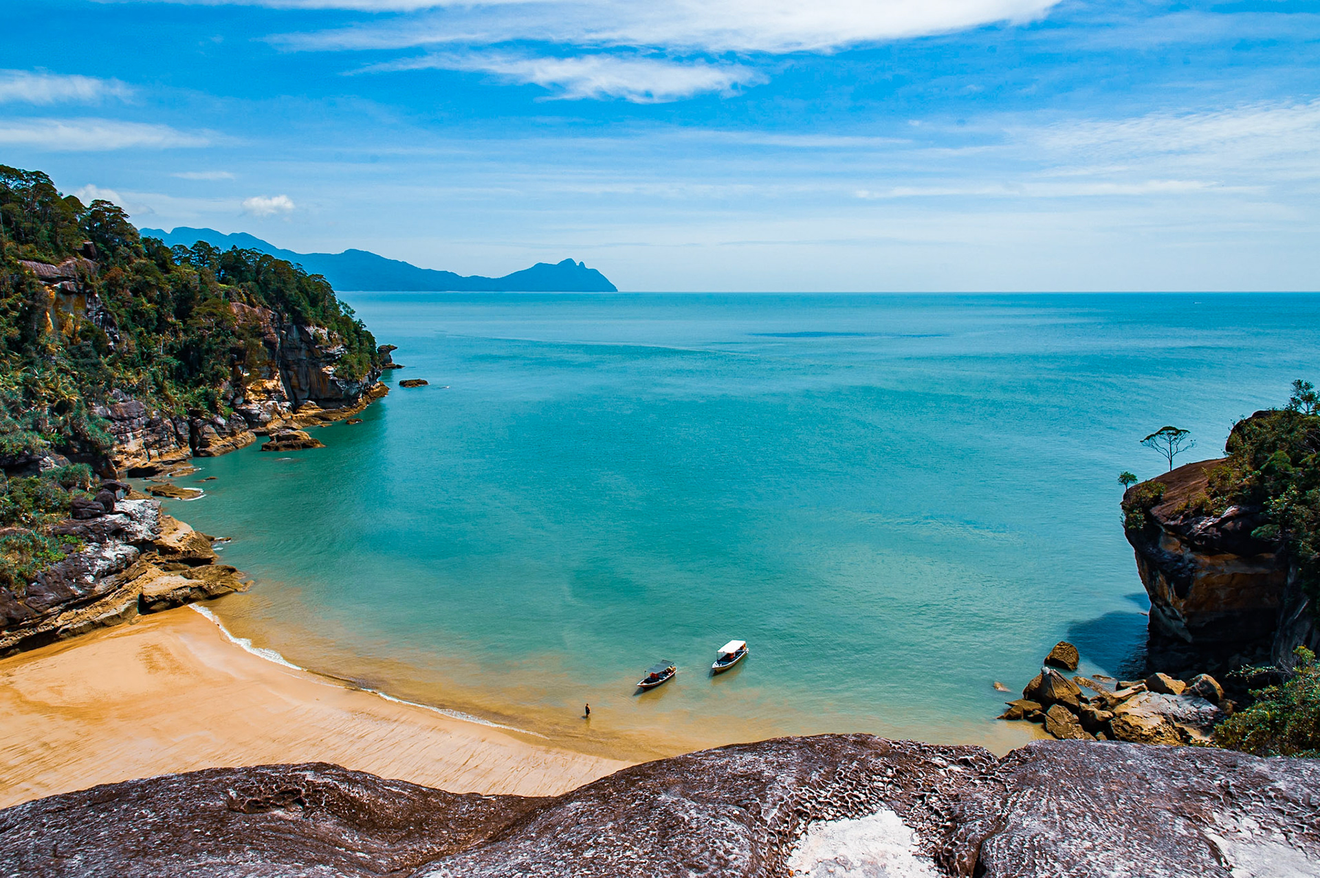 Bako National Park, this is where the adventure truely starts in Borneo! Taking the bus from Kuching and then a speedboat to the park entrance. The tide was in so we have to wade ashore and onto a stunning wild beach and into the jungle. Bako National park has amazing hiking trails, through the jungles and across the island penisular to deserted jungle beaches. Before taking a local boat back to our jungle cabin! Famous for its Proboscis  Monkeys which laze around in the trees just outside our banda.