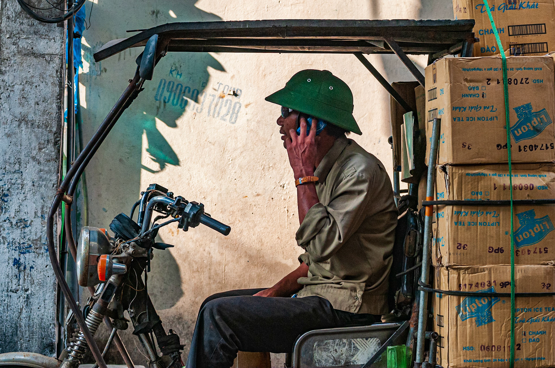The streets of Hanoi, bustling with oriental scenes of markets, motorbikes, food, road-side restaurants, tuk-tuks, Chinese lanterns, cone-shaped hats, dangerously low-hanging wires and bird cages!! Hours of attention for a wandering photographer who isn't afraid of getting lost!