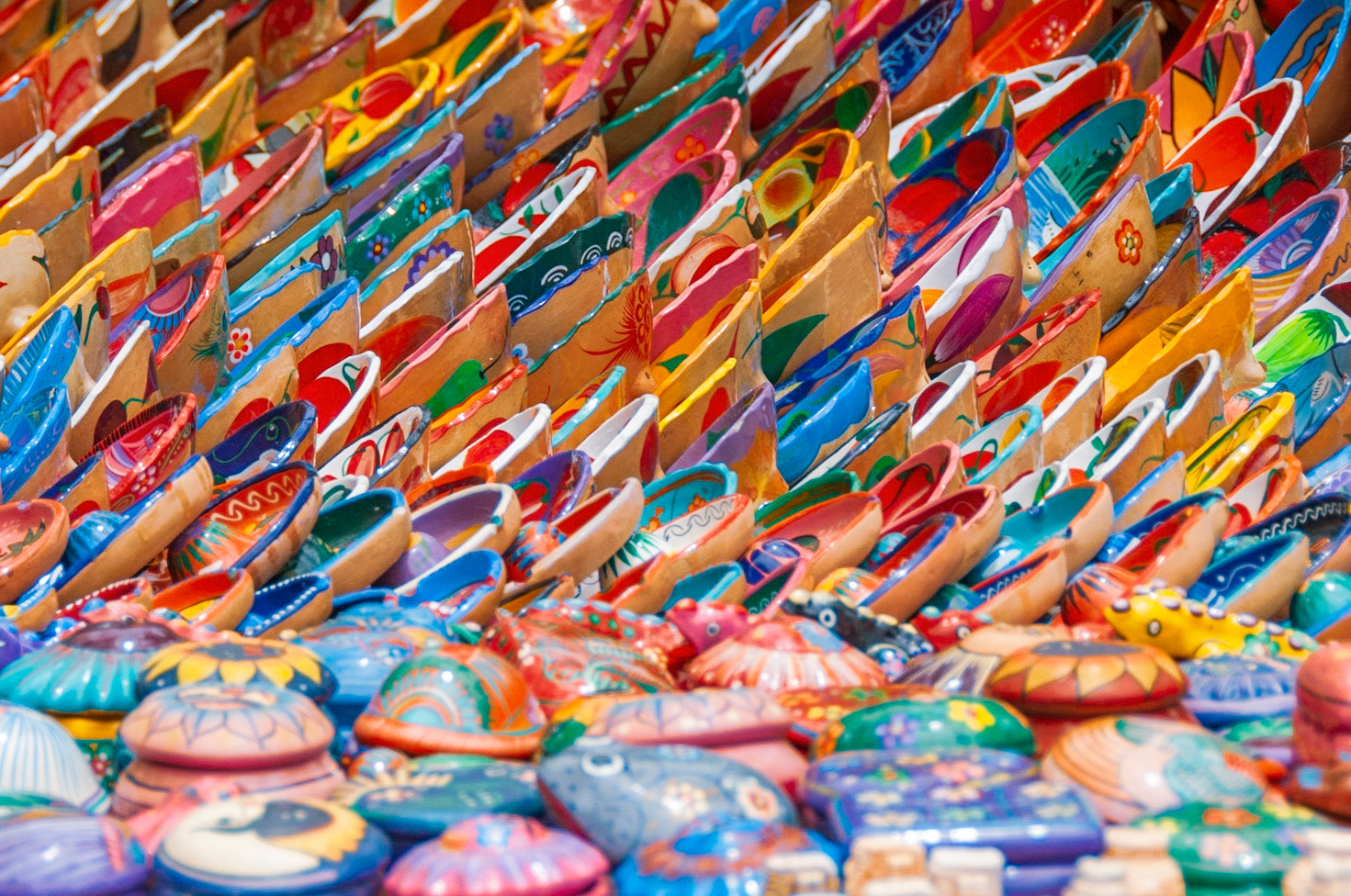 Merida, Mexico, walking under the shade of the trees to escape the tropical heat, surrounded by arts and crafts stalls. This one was by far the brightest and boldest with hundreds of ceramic plates and bowls. No doubt, all with a "special price for you my friend"...