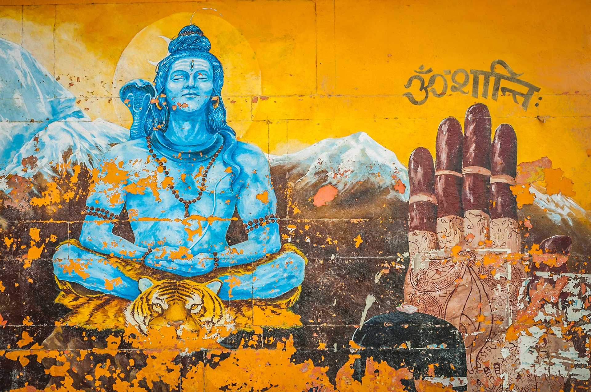 Walking along the Ghats of the River Ganges in Varanasi, India, really is quite the surreal experience. On one side, you have markets, food-stalls, music, burning-incense and art graffitied walls and street cafes. To your other side, you have the most sacred place in the Hindu world for cremating (if your family can afford it) the dead. Evening candle lit rituals are held throughout the year with chanting, singing , performing all under candle light as the current of the mighty River Ganges carries away the remains of those Hindus lucky enough to finish their journey in Shivas City of Light.